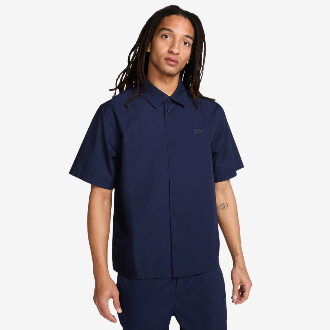 Nike Club Short Sleeve Button T-Shirt Image 1 of 5. Tap to open photo gallery.