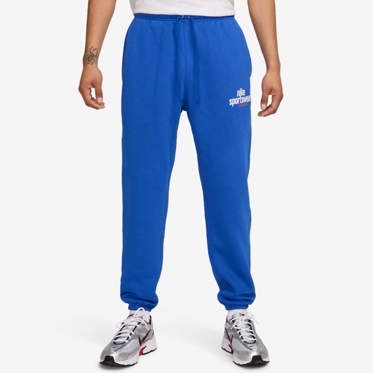 Nike NSW Club BB CF Pant GFX Image 1 of 5. Tap to open photo gallery.