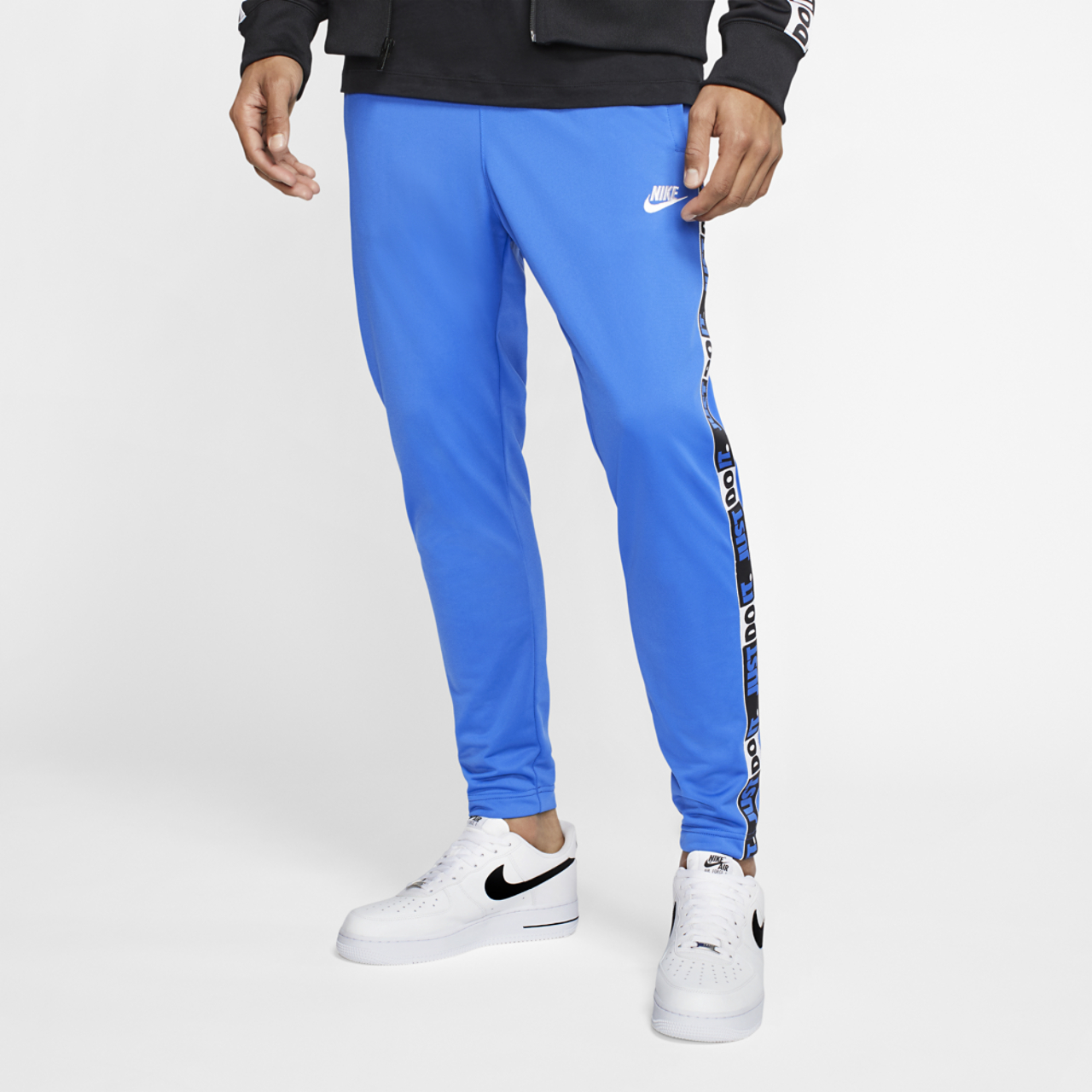 Nike JDI Tape Pants Image 1 of 2. Tap to open photo gallery.