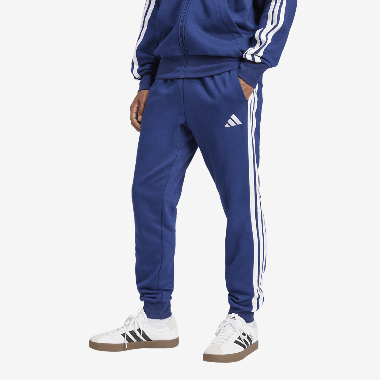 adidas Essentials 3-Stripes Fleece Joggers Image 1 of 6. Tap to open photo gallery.