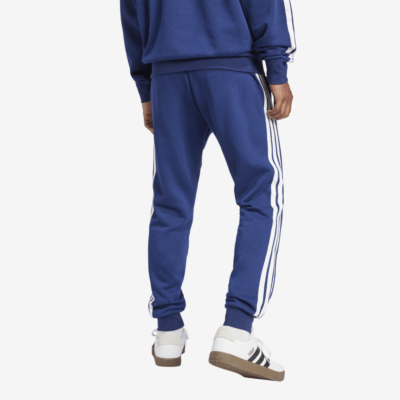 adidas Essentials 3-Stripes Fleece Joggers Image 2 of 6. Tap to open photo gallery.