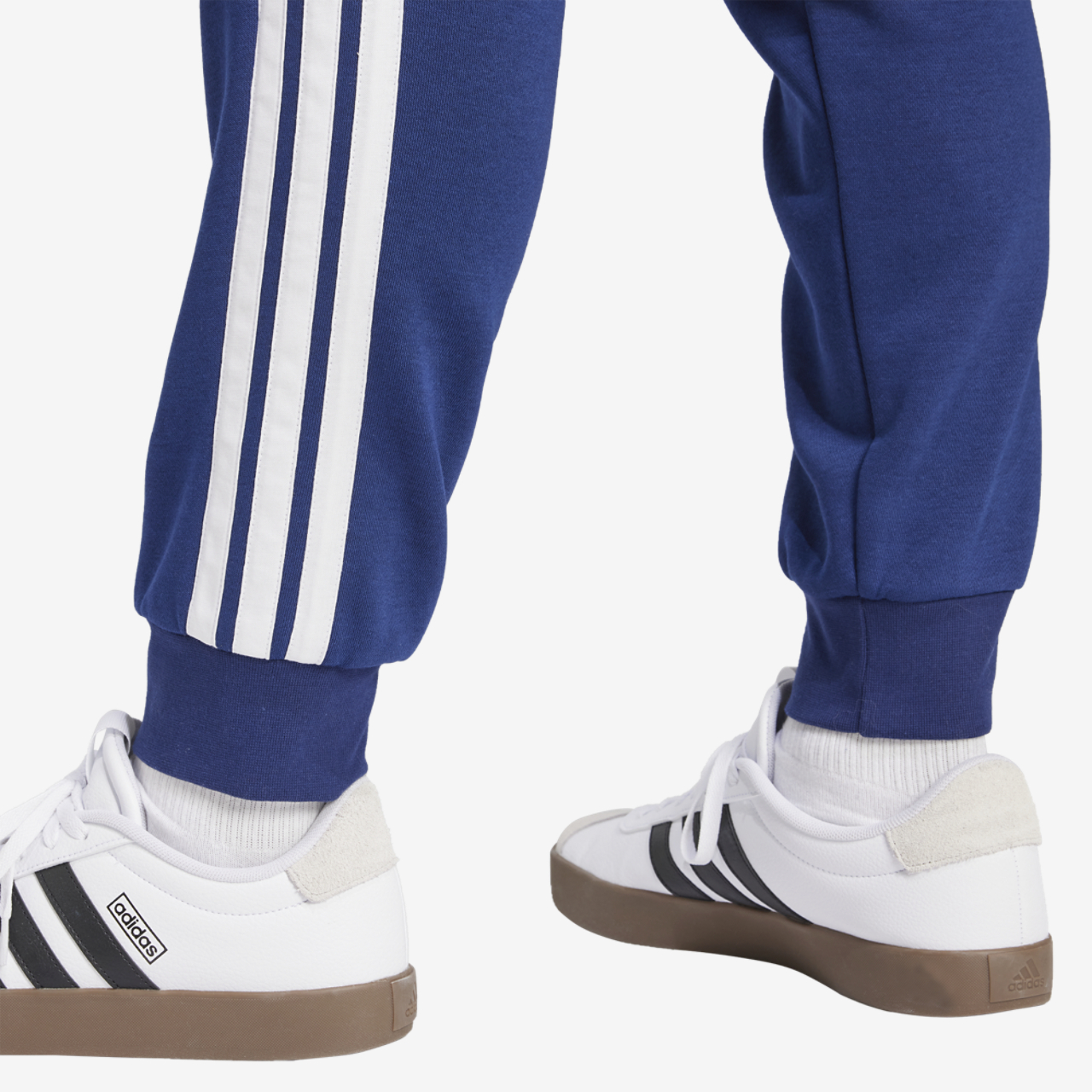 adidas Essentials 3-Stripes Fleece Joggers Image 4 of 6. Tap to open photo gallery.