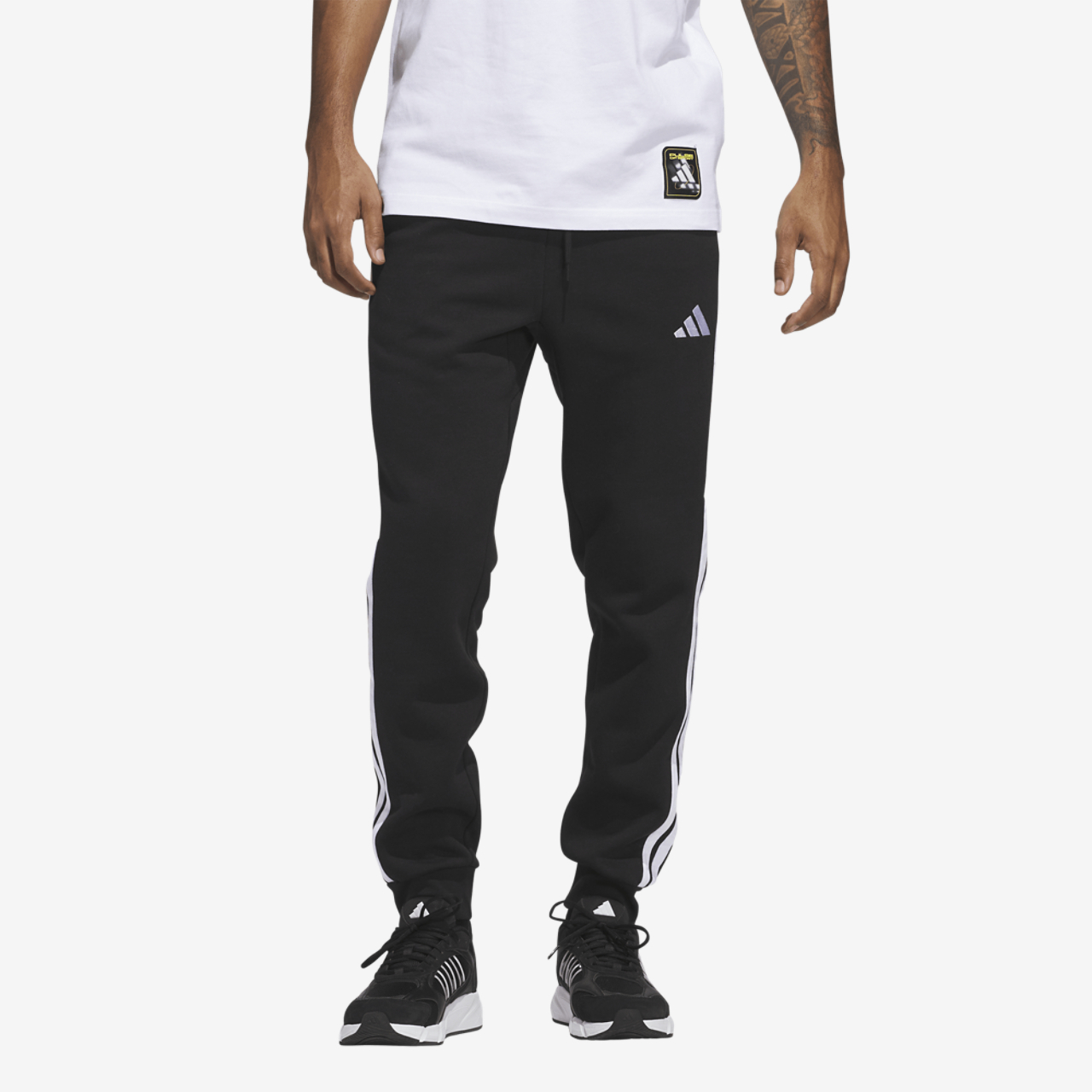 adidas Essentials 3-Stripes Fleece Joggers Image 1 of 6. Tap to open photo gallery.