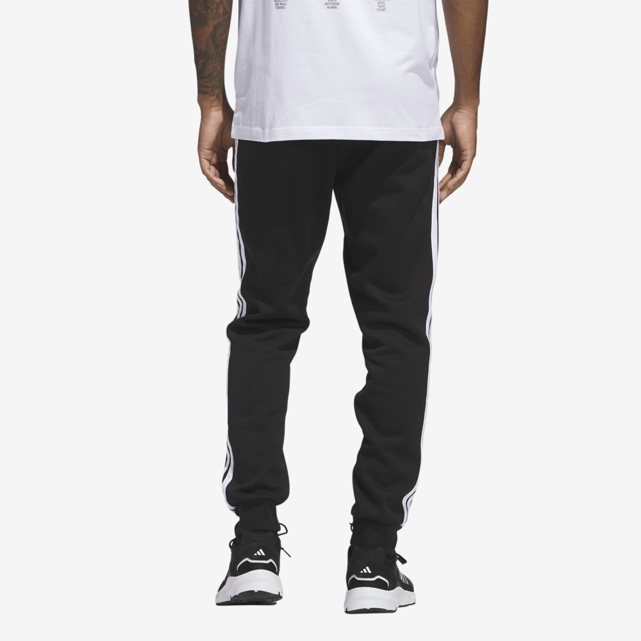adidas Essentials 3-Stripes Fleece Joggers Image 2 of 6. Tap to open photo gallery.