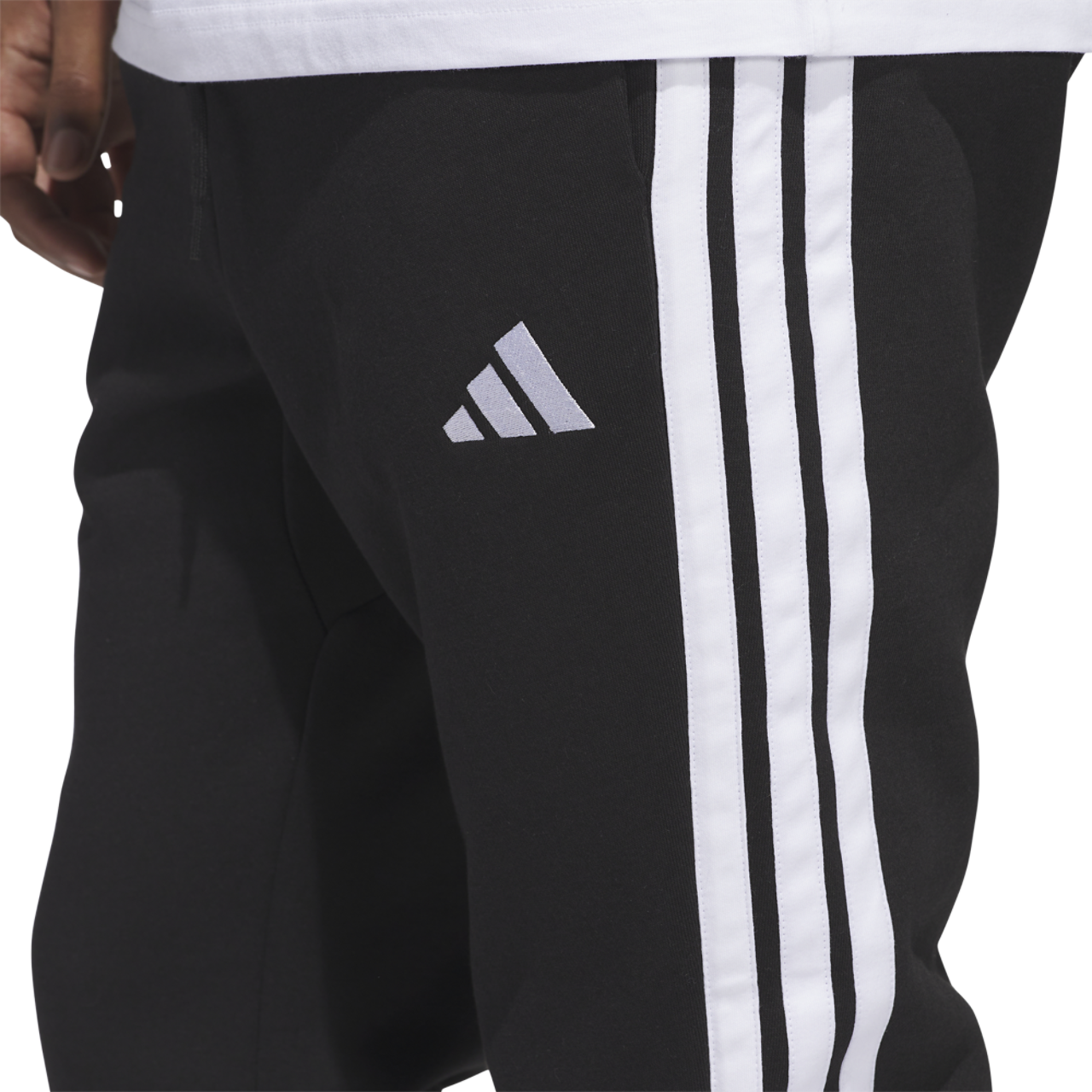 adidas Essentials 3-Stripes Fleece Joggers Image 3 of 6. Tap to open photo gallery.