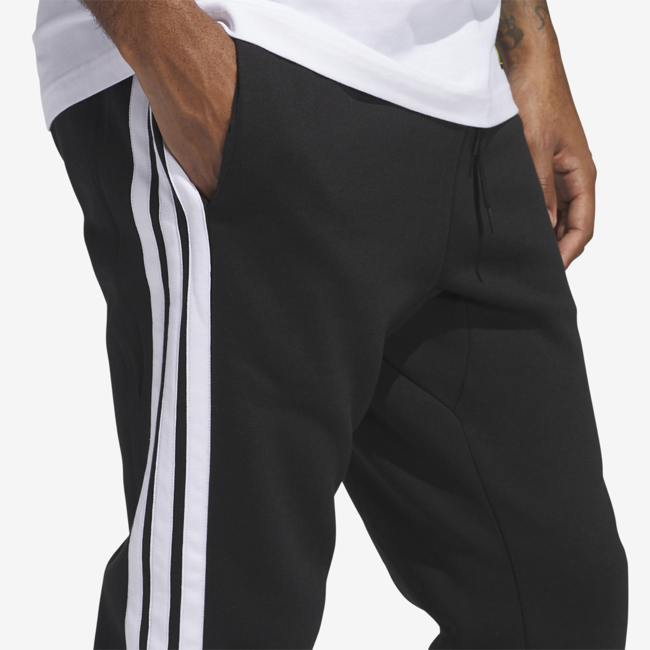 adidas Essentials 3-Stripes Fleece Joggers Image 4 of 6. Tap to open photo gallery.