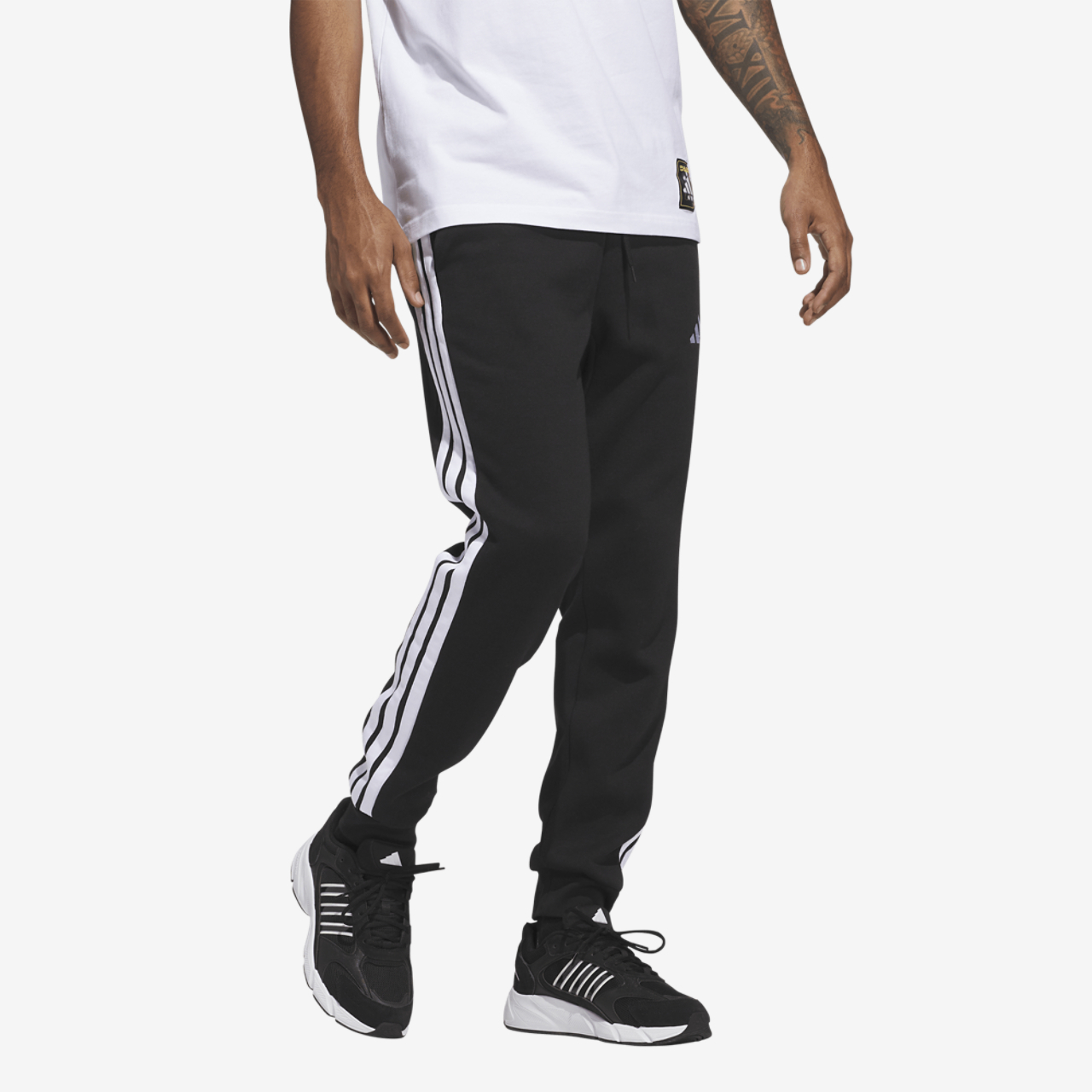 adidas Essentials 3-Stripes Fleece Joggers Image 5 of 6. Tap to open photo gallery.