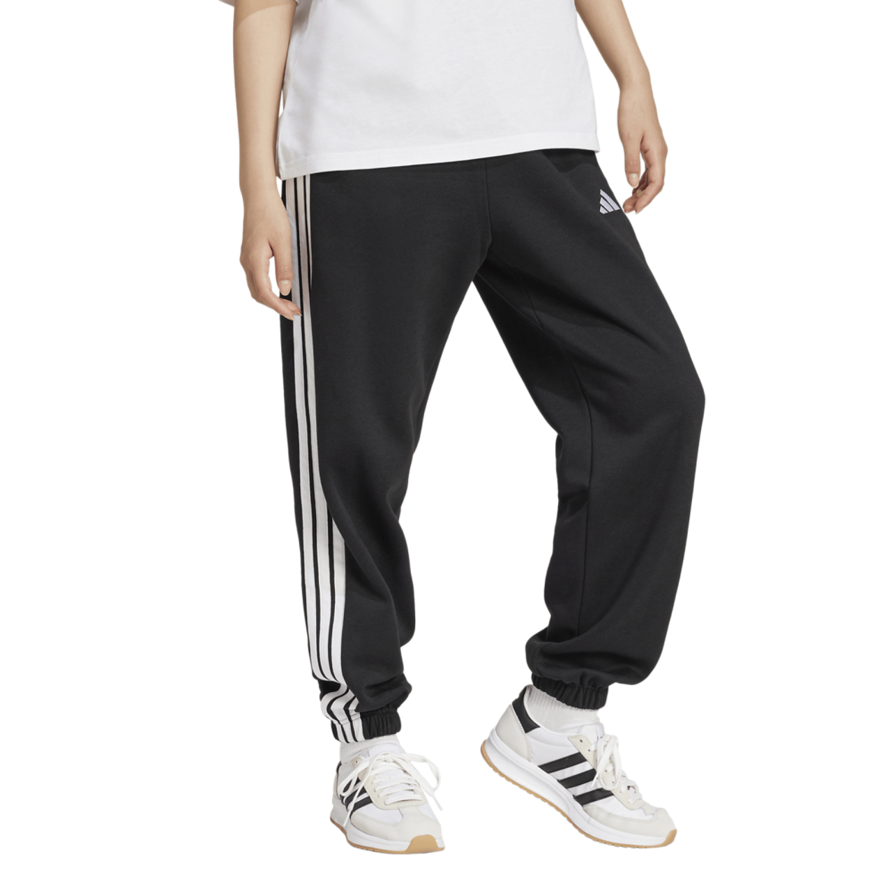 adidas Essentials 3-Stripes Fleece Loose Pants Image 1 of 5. Tap to open photo gallery.