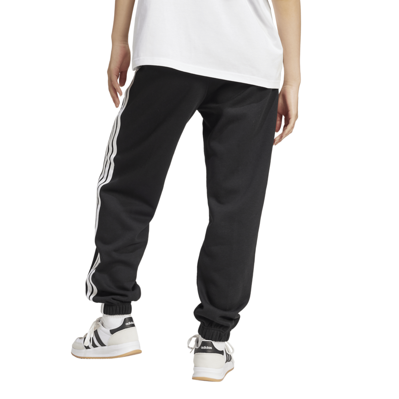 adidas Essentials 3-Stripes Fleece Loose Pants Image 2 of 5. Tap to open photo gallery.