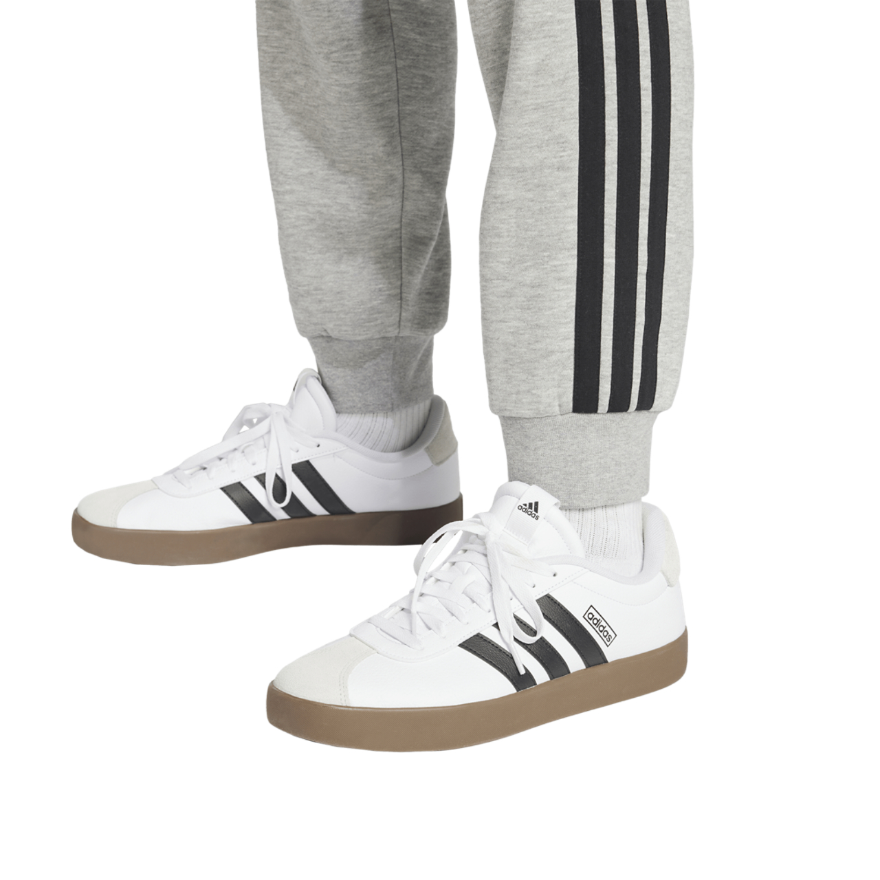 adidas Essentials 3-Stripes Fleece Joggers Image 4 of 6. Tap to open photo gallery.