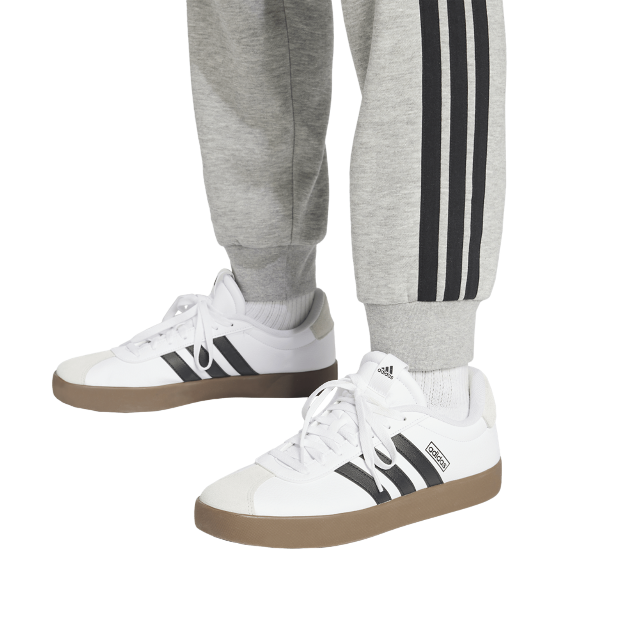 adidas Essentials 3-Stripes Fleece Joggers Image 4 of 6. Tap to open photo gallery.