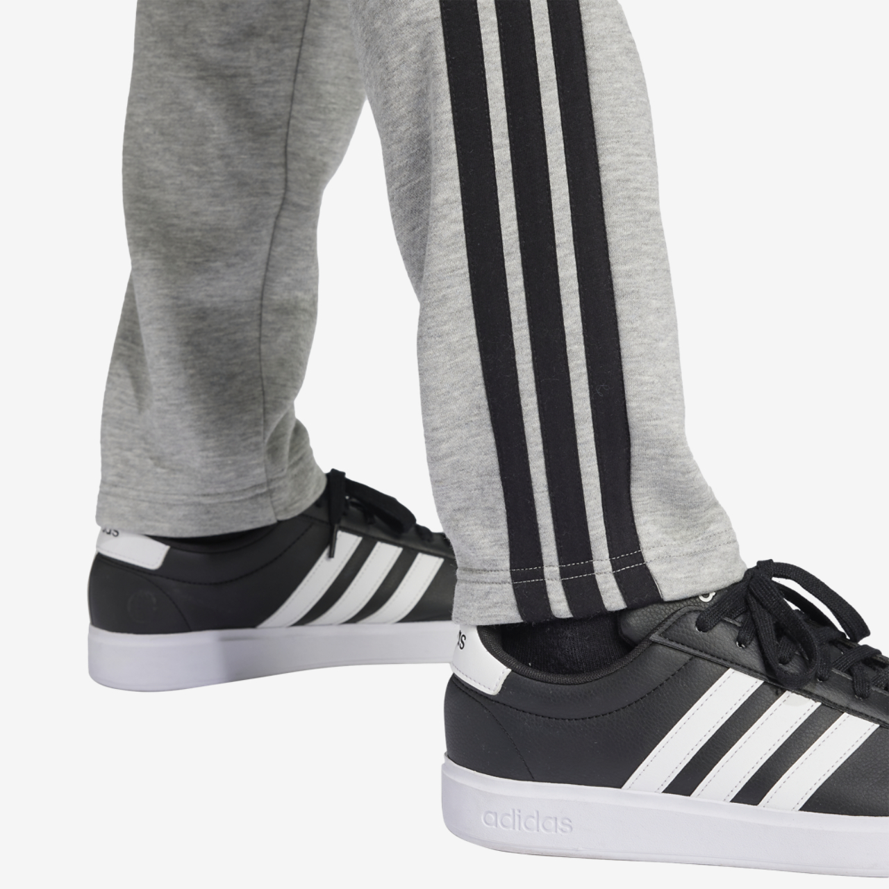 adidas Essentials 3-Stripes Fleece Open Hem Pants Image 3 of 6. Tap to open photo gallery.
