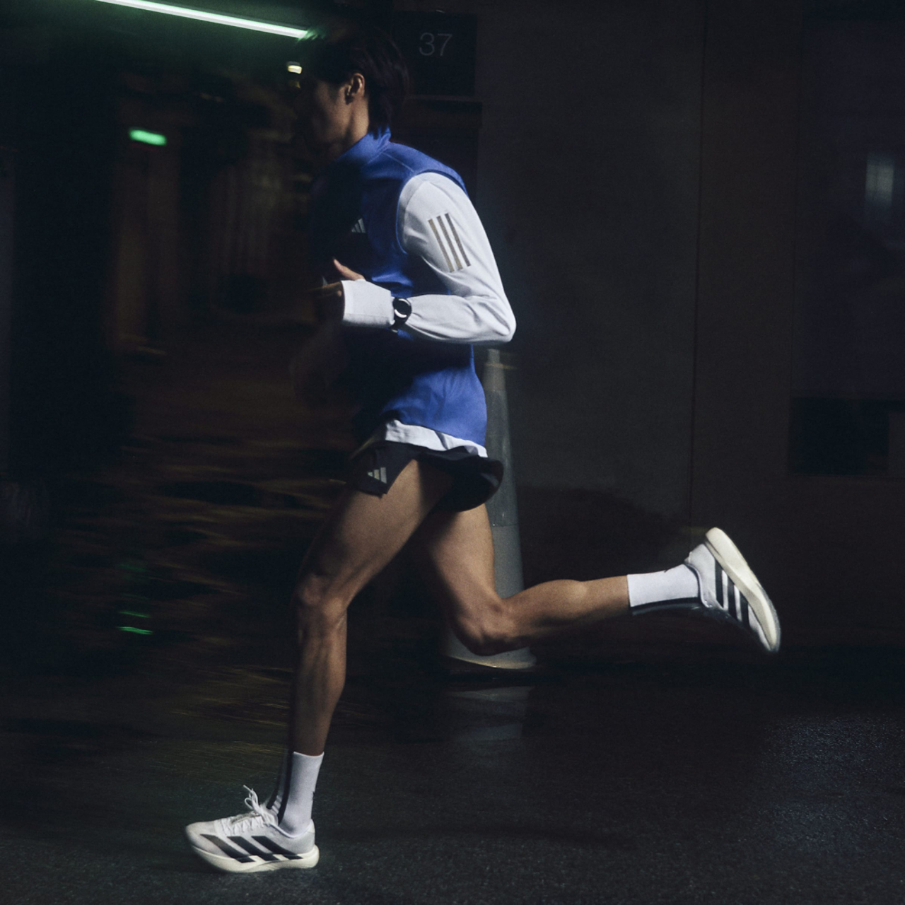 adidas adiZero Evo SL Image 9 of 10. Tap to open photo gallery.