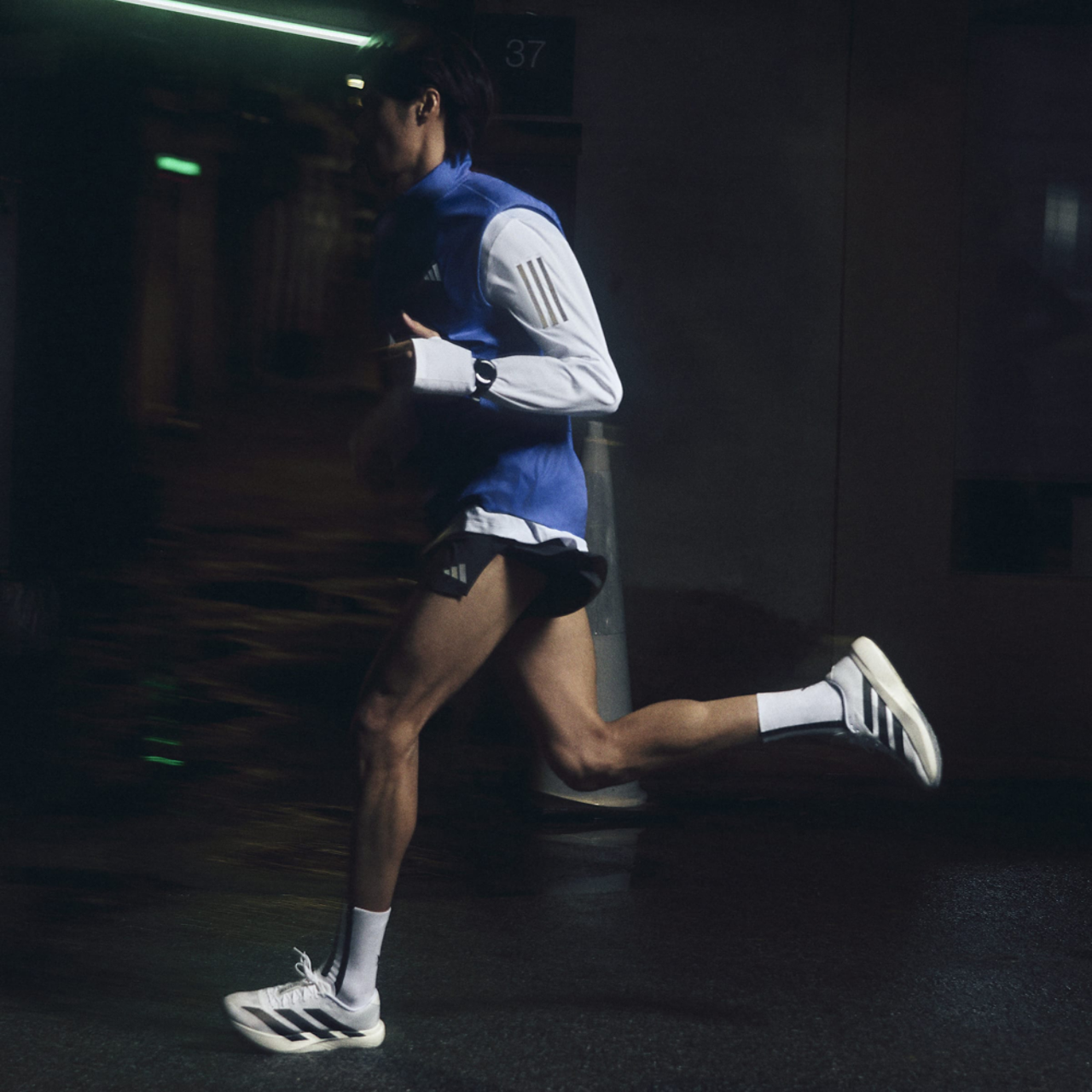 adidas adiZero Evo SL Image 9 of 10. Tap to open photo gallery.