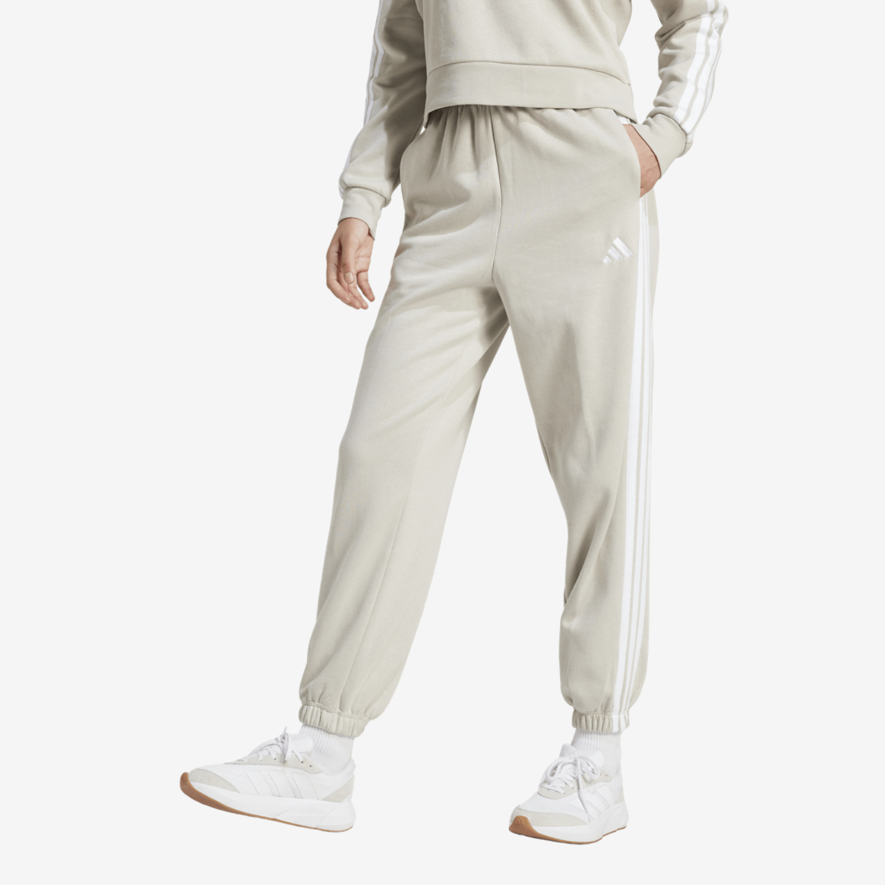adidas Essentials 3-Stripes Fleece Loose Pants Image 1 of 4. Tap to open photo gallery.