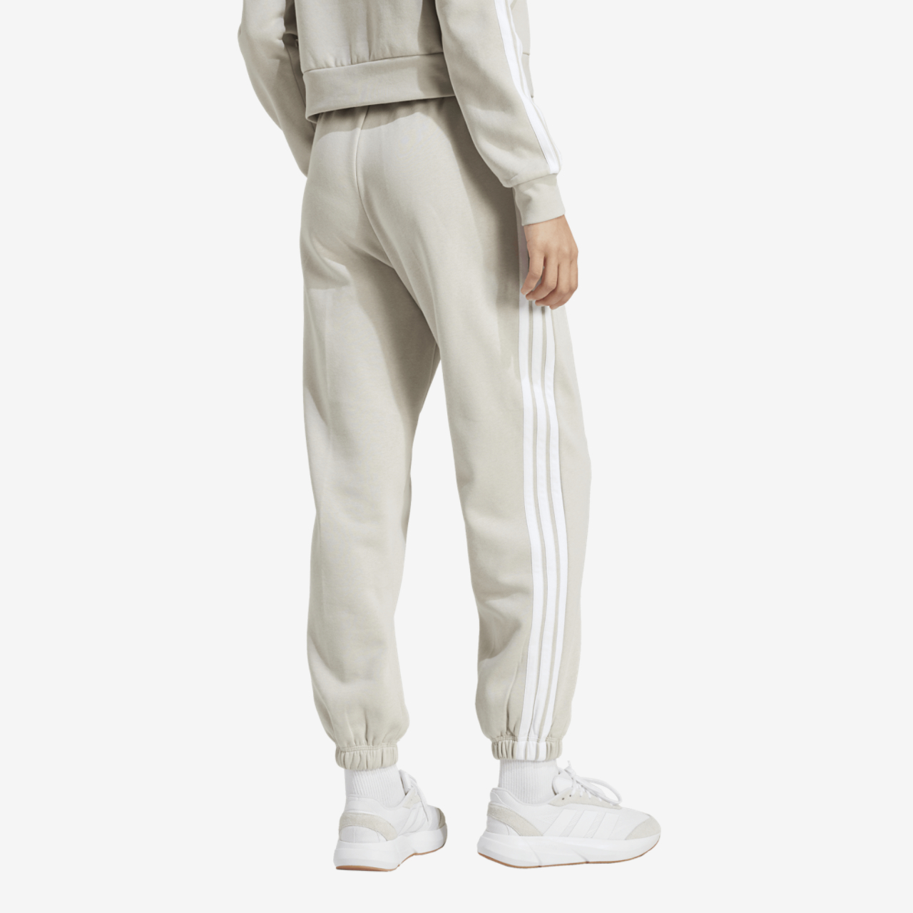 adidas Essentials 3-Stripes Fleece Loose Pants Image 2 of 4. Tap to open photo gallery.