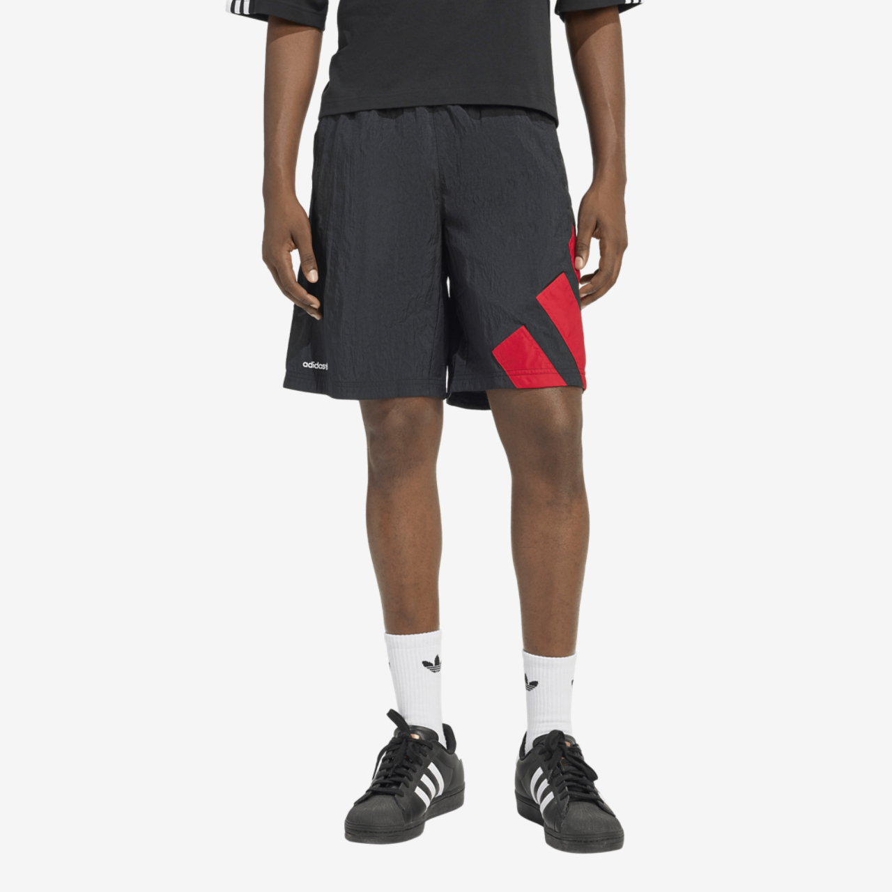 adidas Originals adicolor Blocked 9" Shorts Image 1 of 6. Tap to open photo gallery.