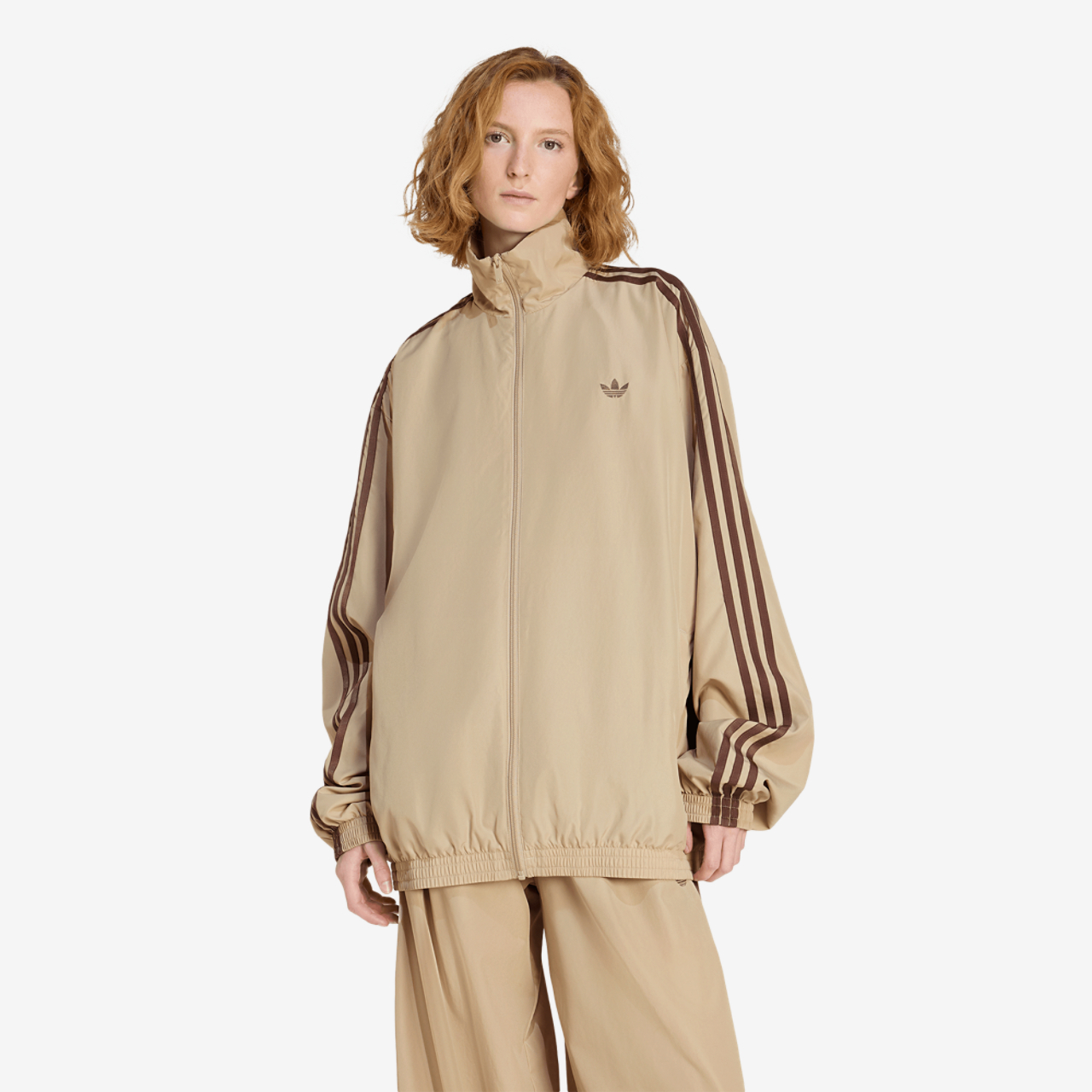 adidas Originals adilenium Firebird Track Top Image 1 of 6. Tap to open photo gallery.