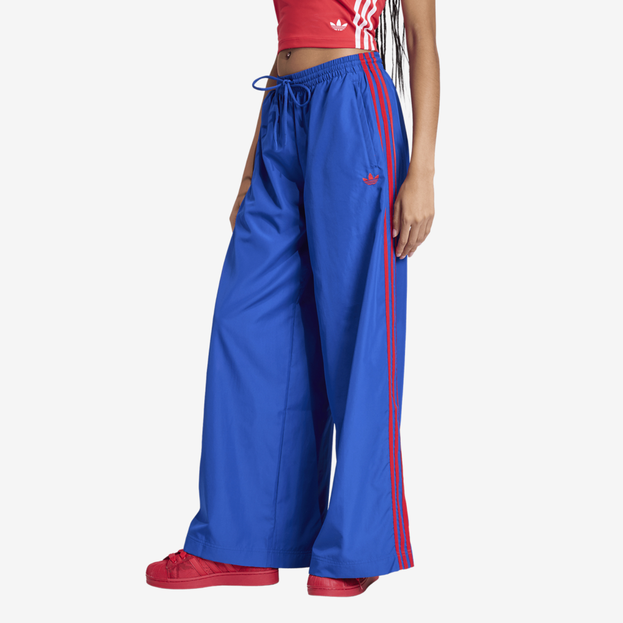 adidas Firebird Track Pants Image 1 of 8. Tap to open photo gallery.