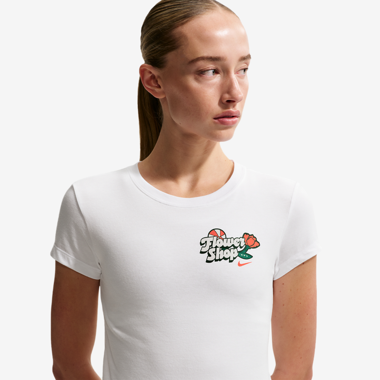 Nike Flower Shop Midcrop Tee Image 1 of 4. Tap to open photo gallery.