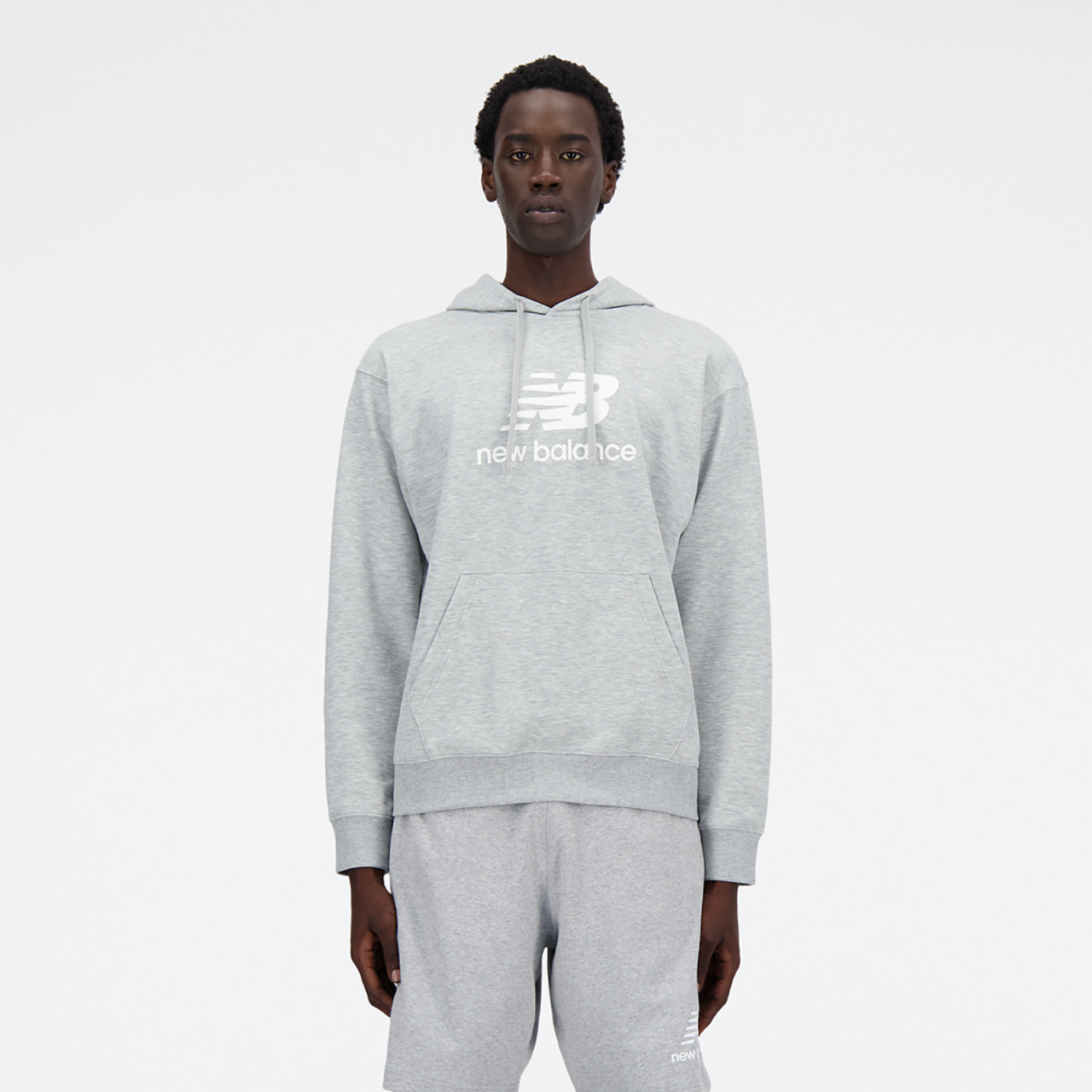 New Balance French Terry Stacked Logo Pullover Hoodie Image 2 of 3. Tap to open photo gallery.