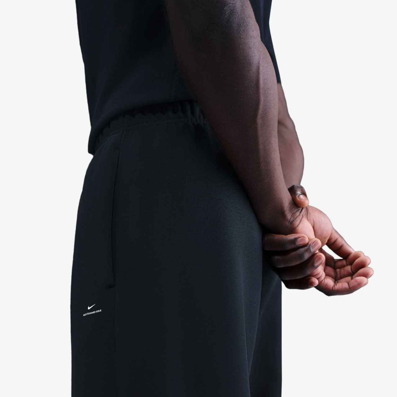 Nike Standard Issue Brushed Open Hem Pants Image 2 of 2. Tap to open photo gallery.