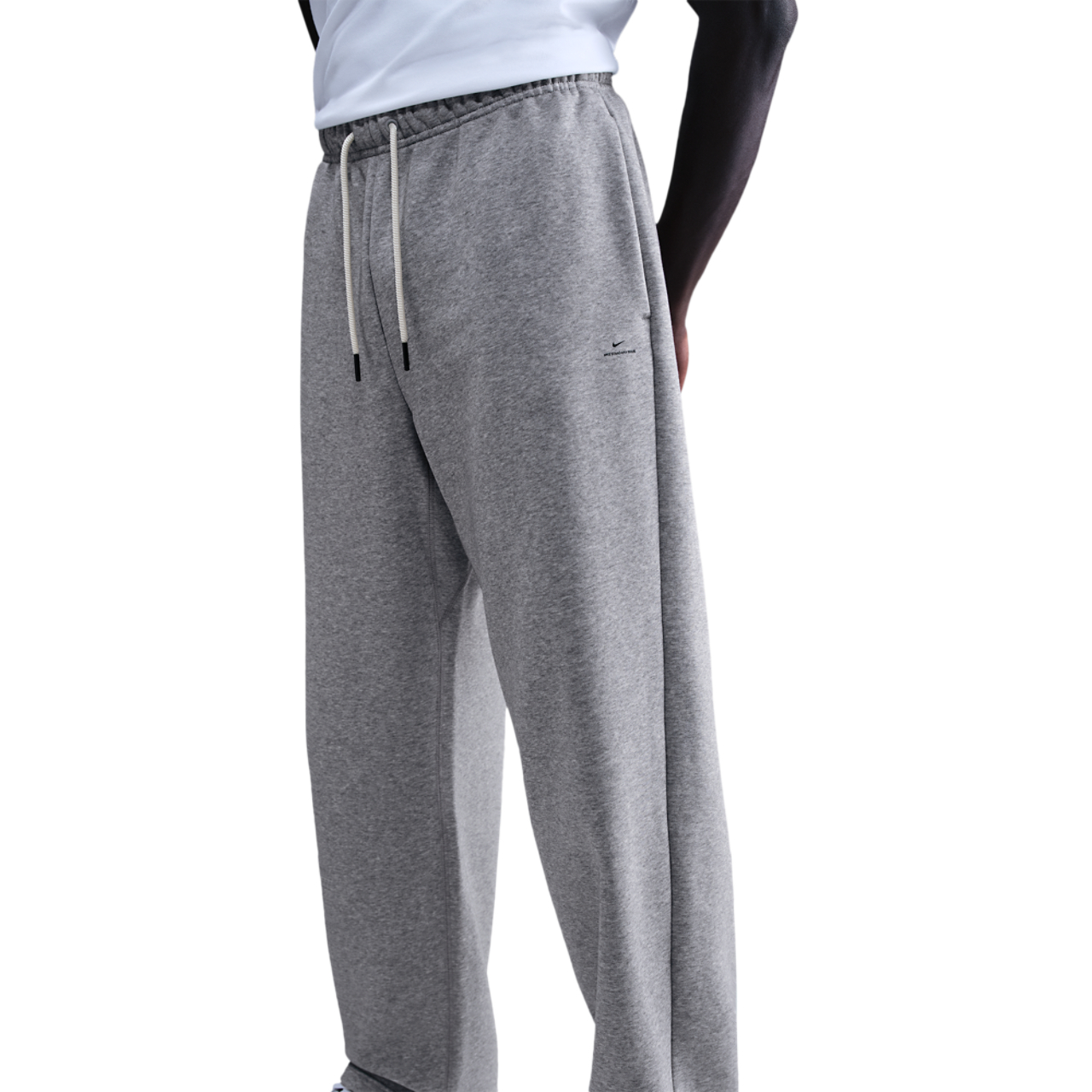 Nike Standard Issue Brushed Open Hem Pants Image 1 of 4. Tap to open photo gallery.