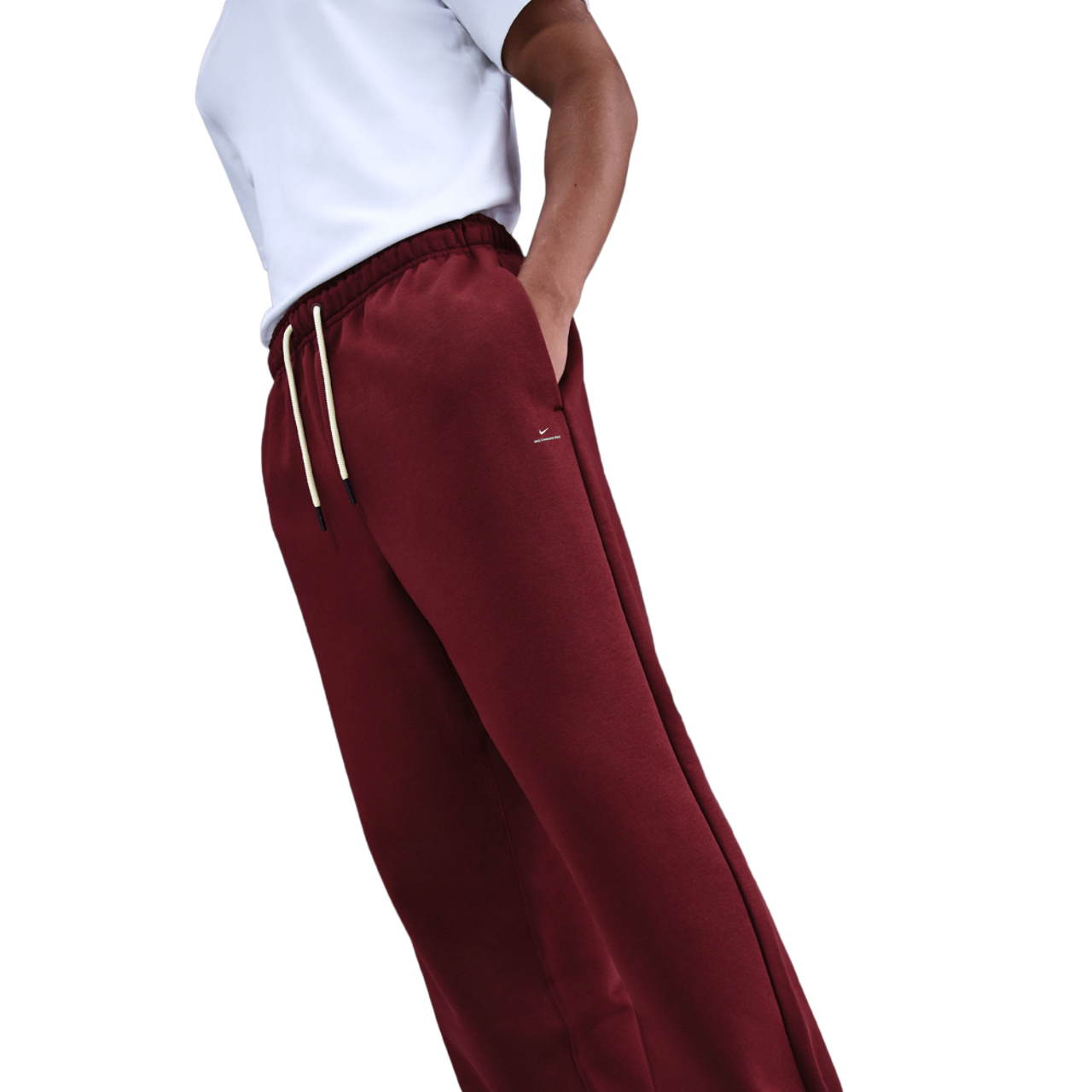 Nike Standard Issue Brushed Open Hem Pants Image 1 of 3. Tap to open photo gallery.