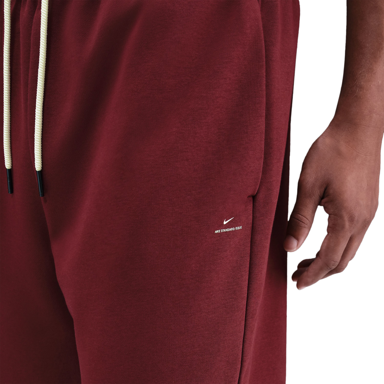 Nike Standard Issue Brushed Open Hem Pants Image 3 of 3. Tap to open photo gallery.