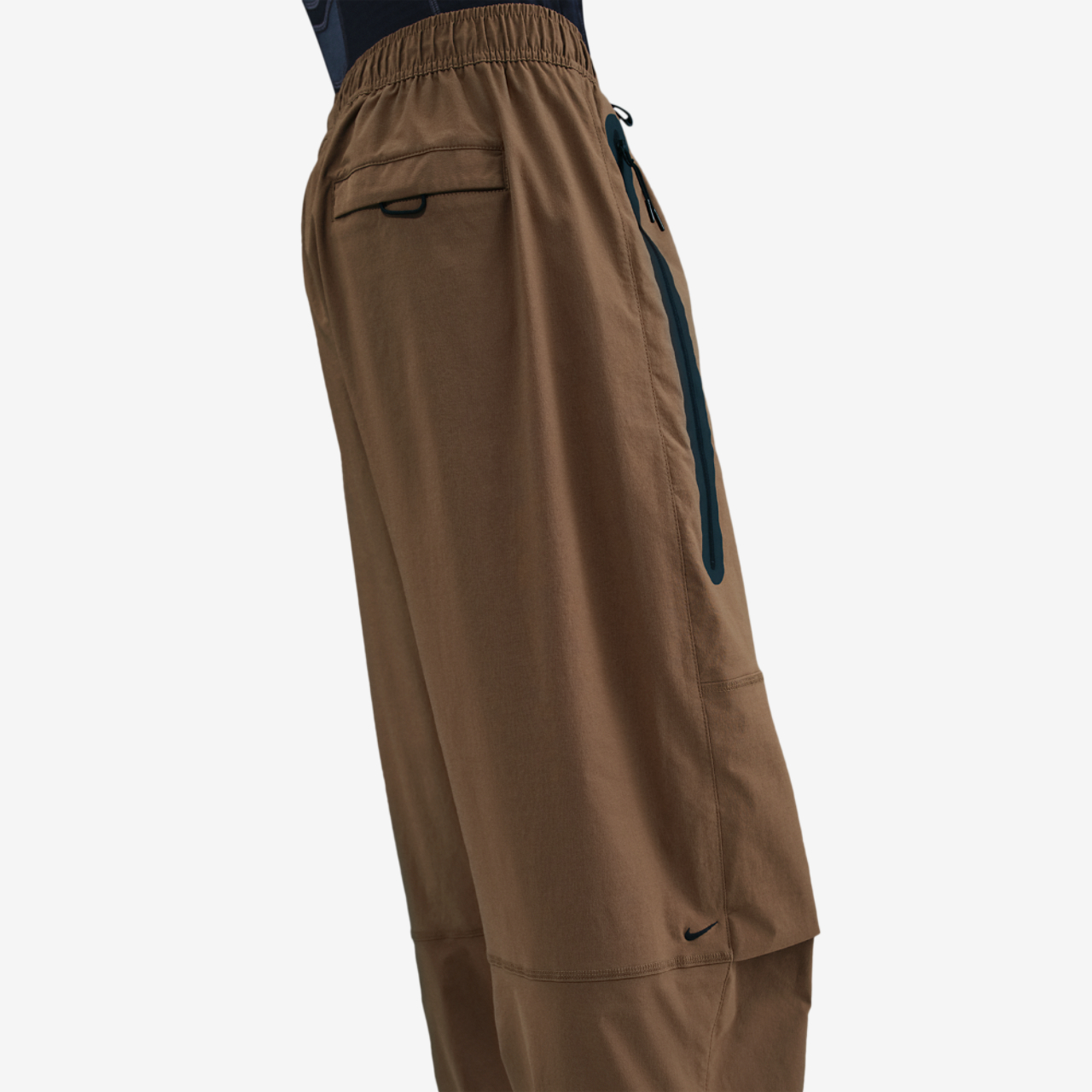Nike Tech Woven Pants OS Image 2 of 4. Tap to open photo gallery.