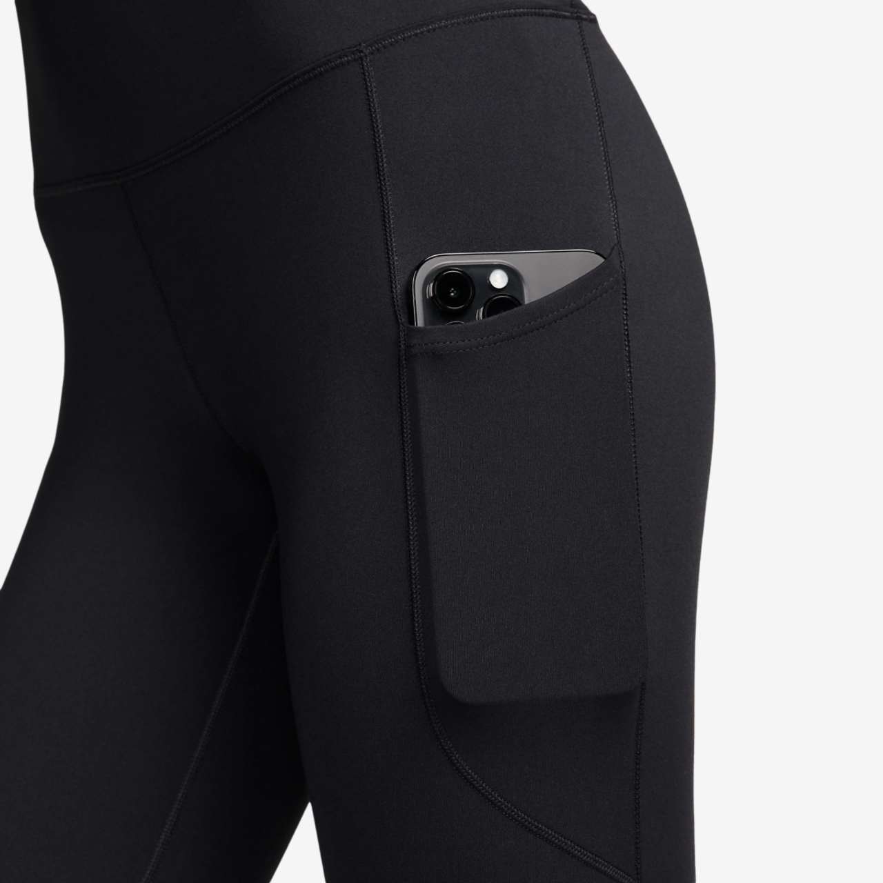 Nike Dri-FIT One High Rise 7/8 Pocket Tights Image 3 of 4. Tap to open photo gallery.