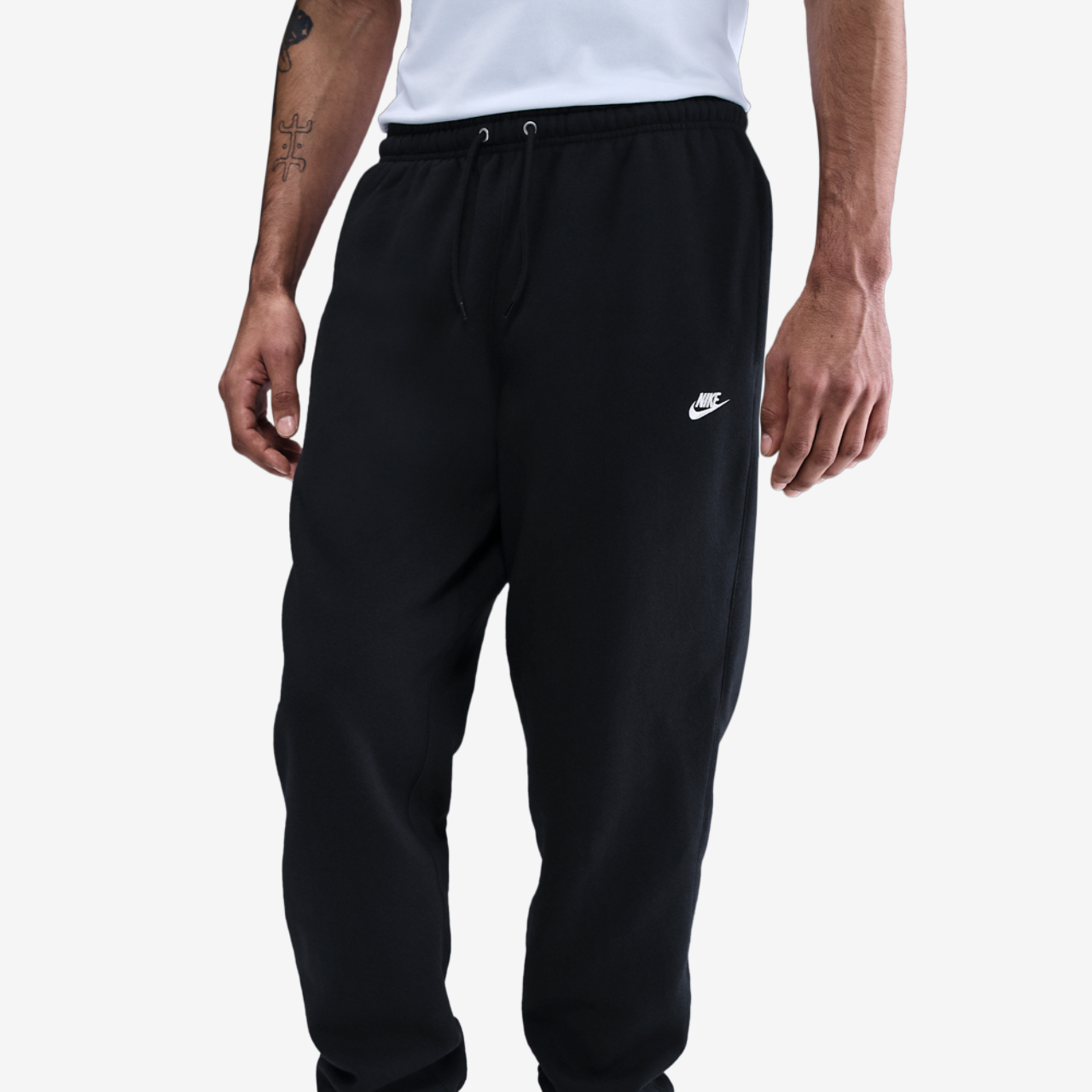 Nike Club Cuff Fleece Pants Image 1 of 4. Tap to open photo gallery.