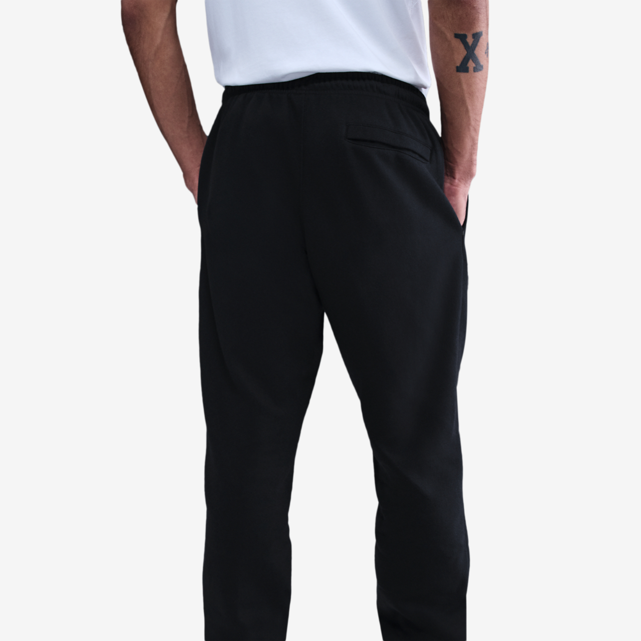 Nike Club Cuff Fleece Pants Image 2 of 4. Tap to open photo gallery.