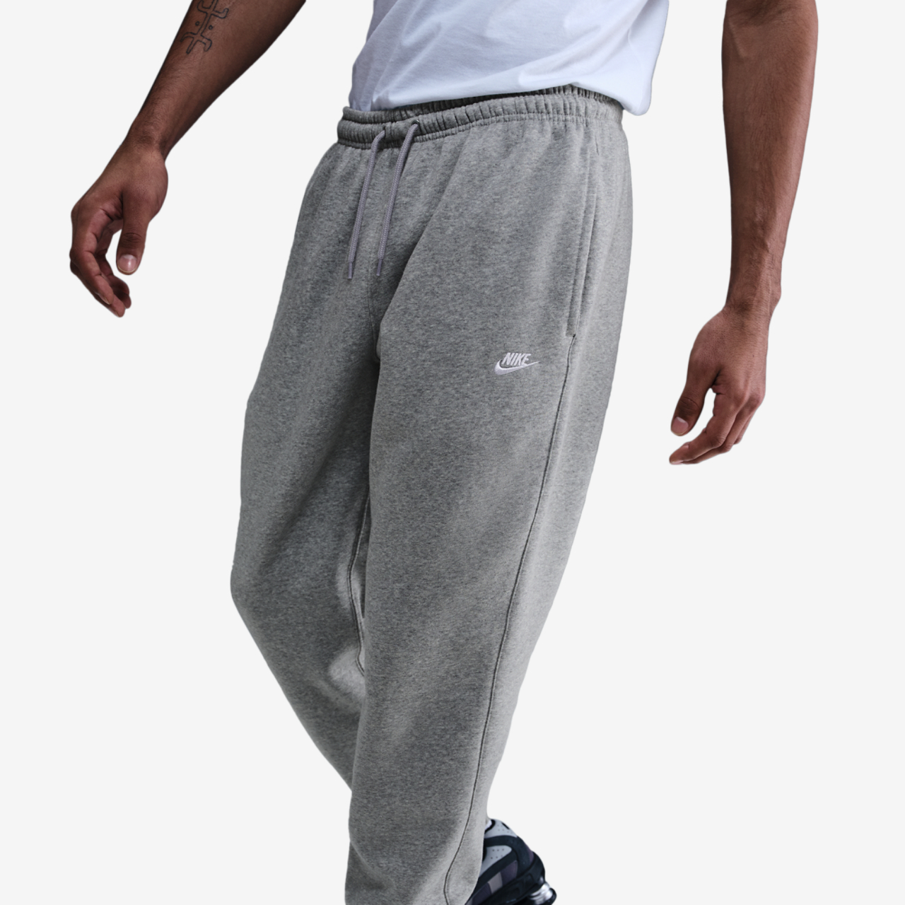 Nike Club Cuff Fleece Pants Image 1 of 4. Tap to open photo gallery.