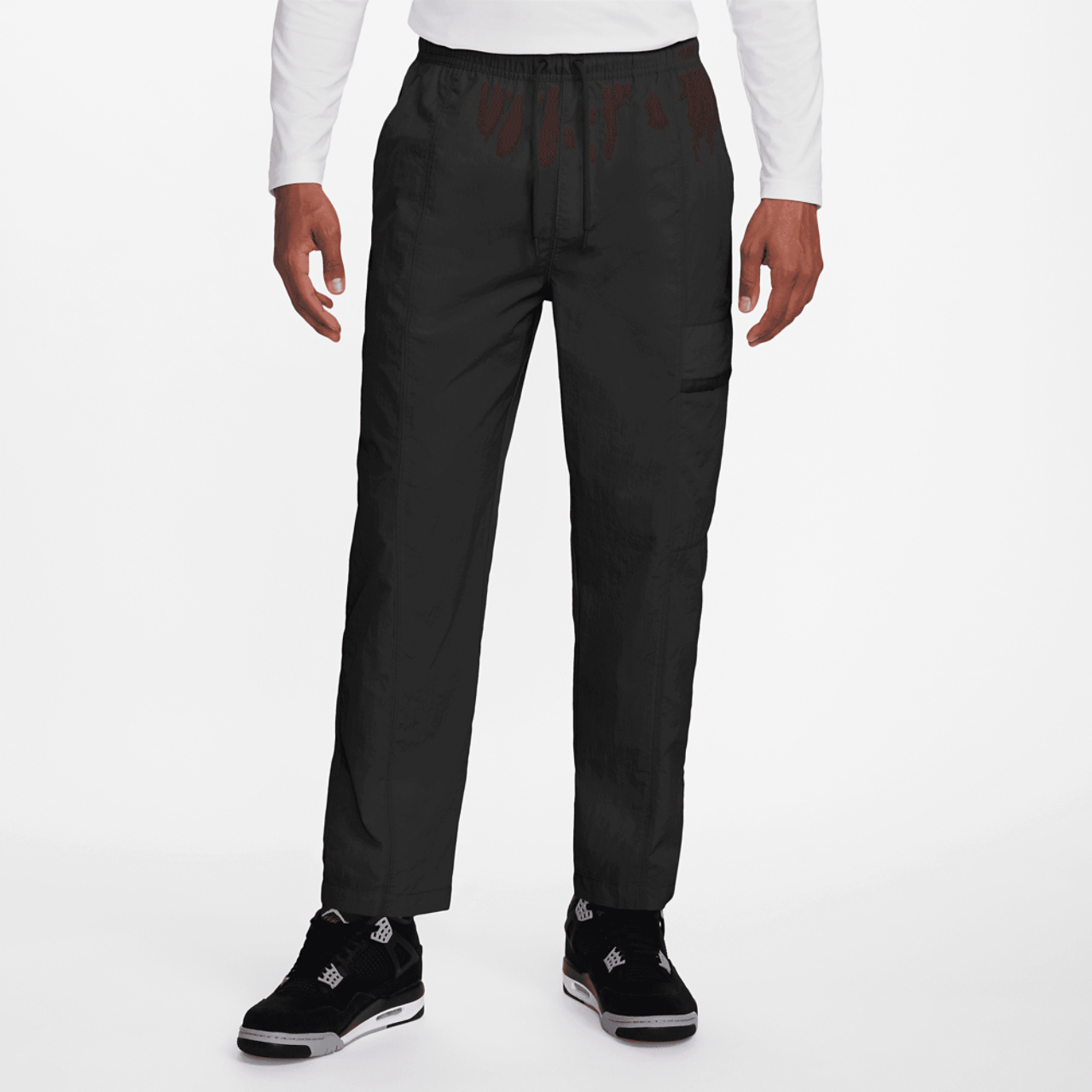 Jordan Essential Woven Pants Image 1 of 3. Tap to open photo gallery.
