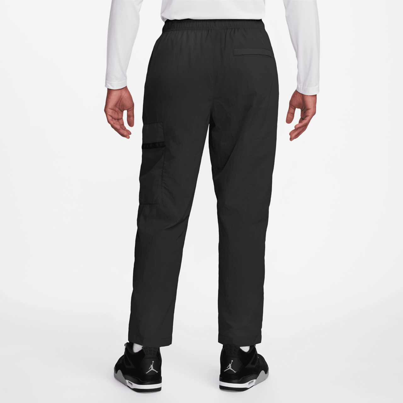 Jordan Essential Woven Pants Image 3 of 3. Tap to open photo gallery.