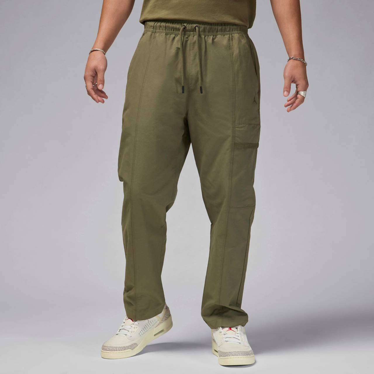 Jordan Essential Woven Pants Image 1 of 5. Tap to open photo gallery.