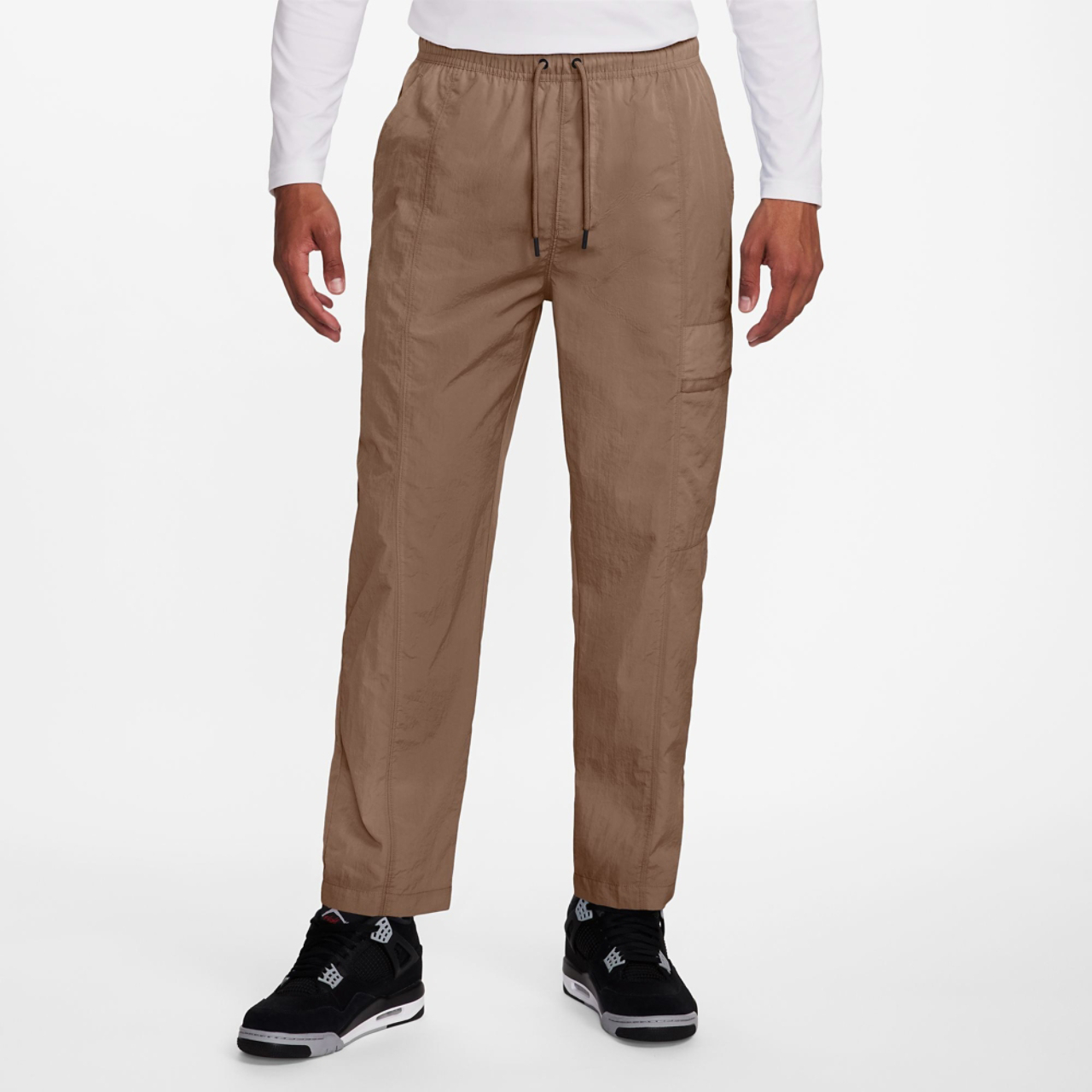 Jordan Essential Woven Pants Image 2 of 4. Tap to open photo gallery.