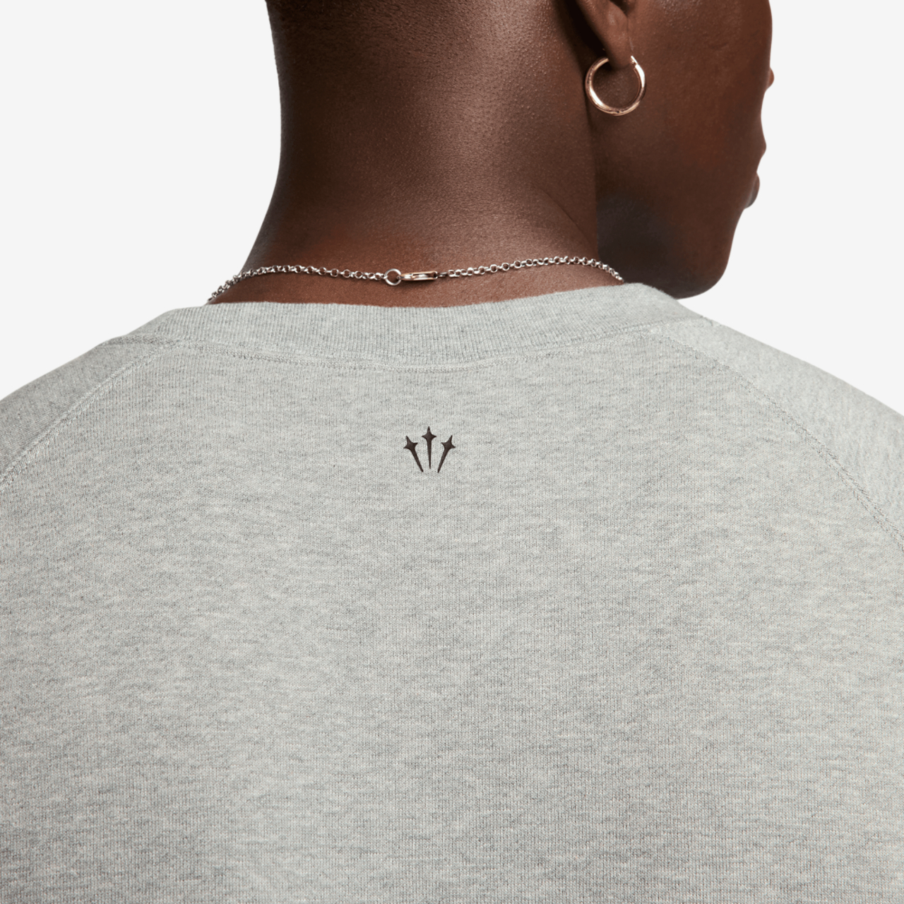 Nike NRG Nocta CS Fleece Crew Image 6 of 9. Tap to open photo gallery.