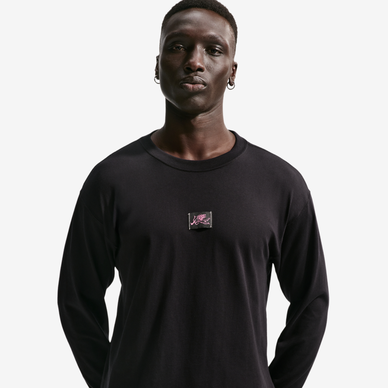 Nike NSW Vday Loose Long Sleeve Tee Image 1 of 4. Tap to open photo gallery.