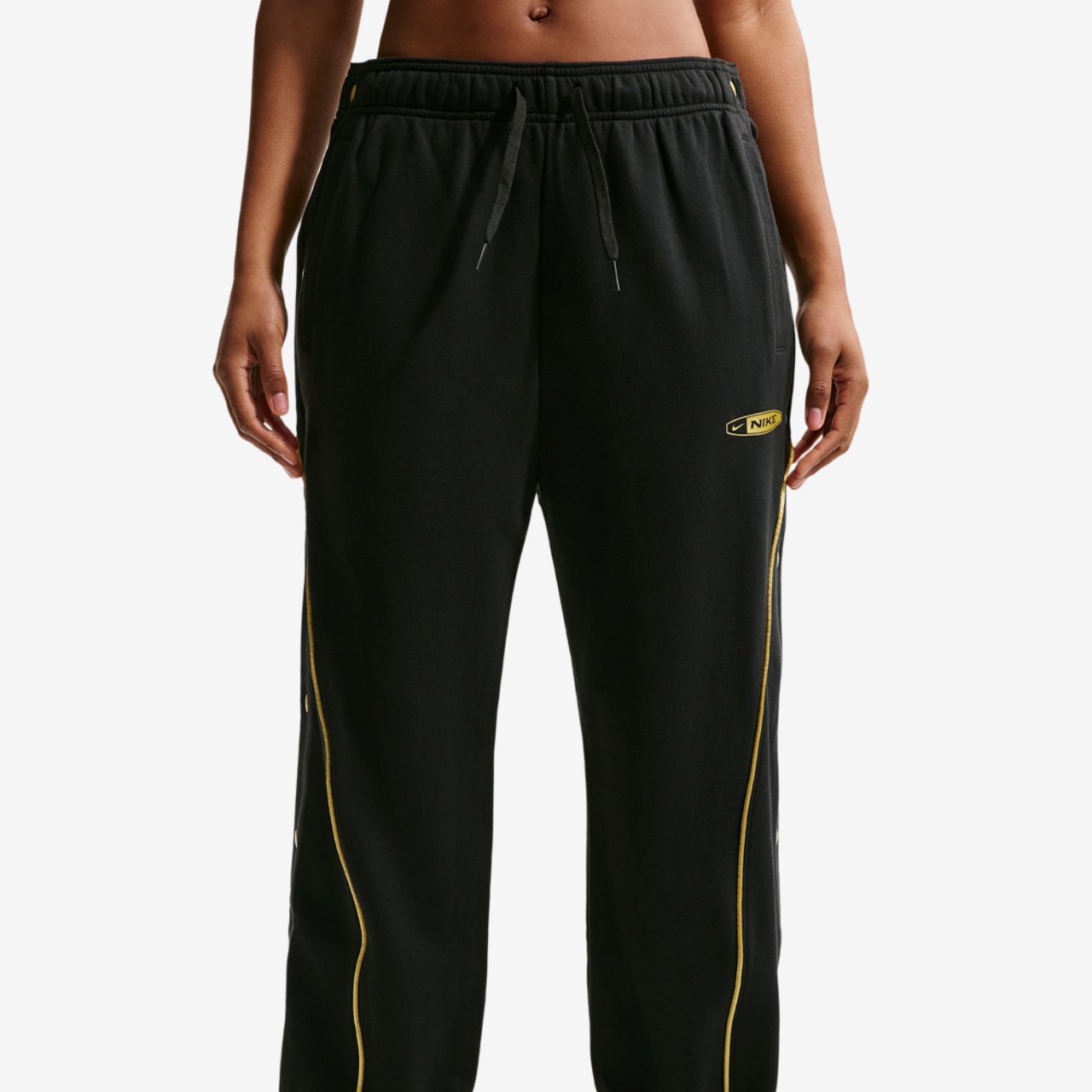 Nike Dri-FIT Swoosh Fleece Tearaway Pants Image 1 of 2. Tap to open photo gallery.