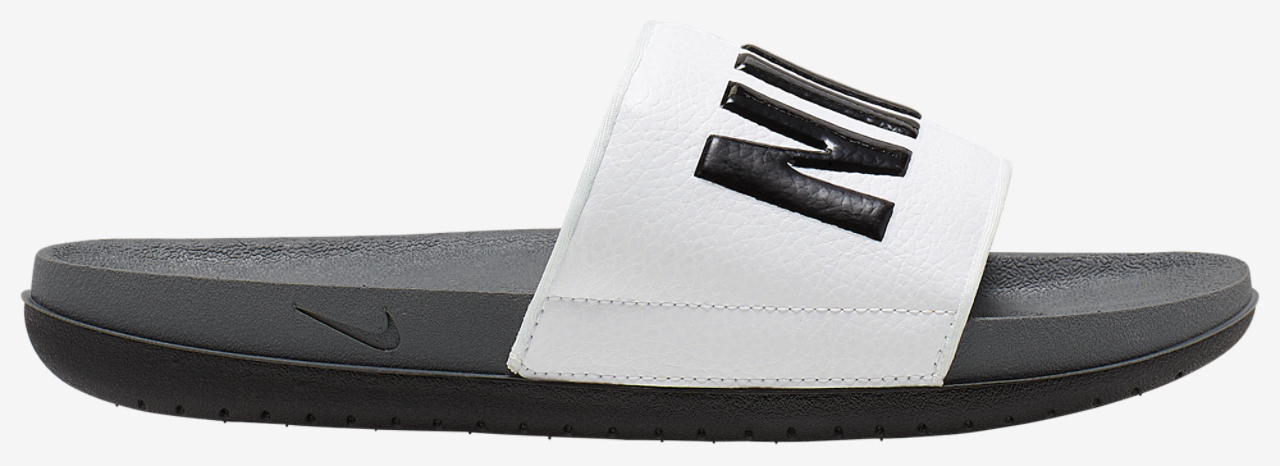 Nike Offcourt Slides Image 1 of 3. Tap to open photo gallery.