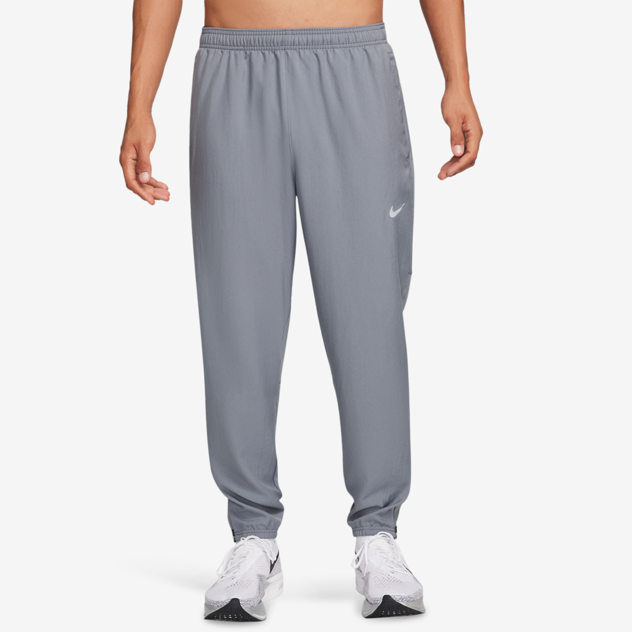 Nike Dri-FIT Challenger Woven Pant Image 1 of 4. Tap to open photo gallery.
