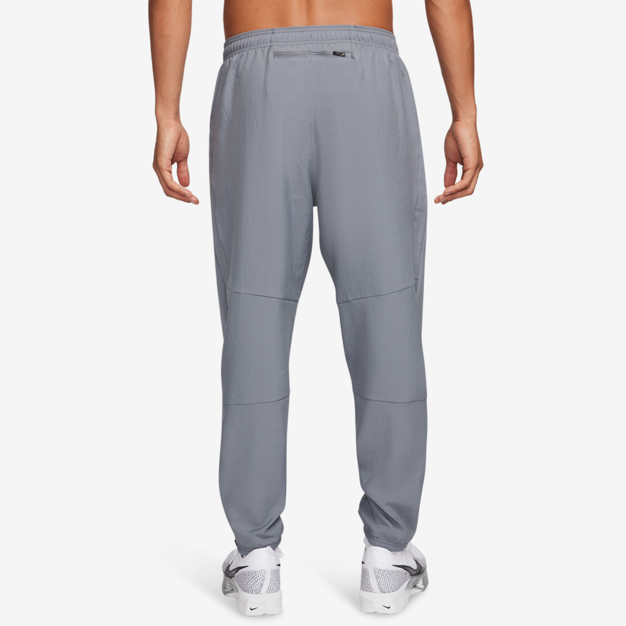 Nike Dri-FIT Challenger Woven Pant Image 2 of 4. Tap to open photo gallery.