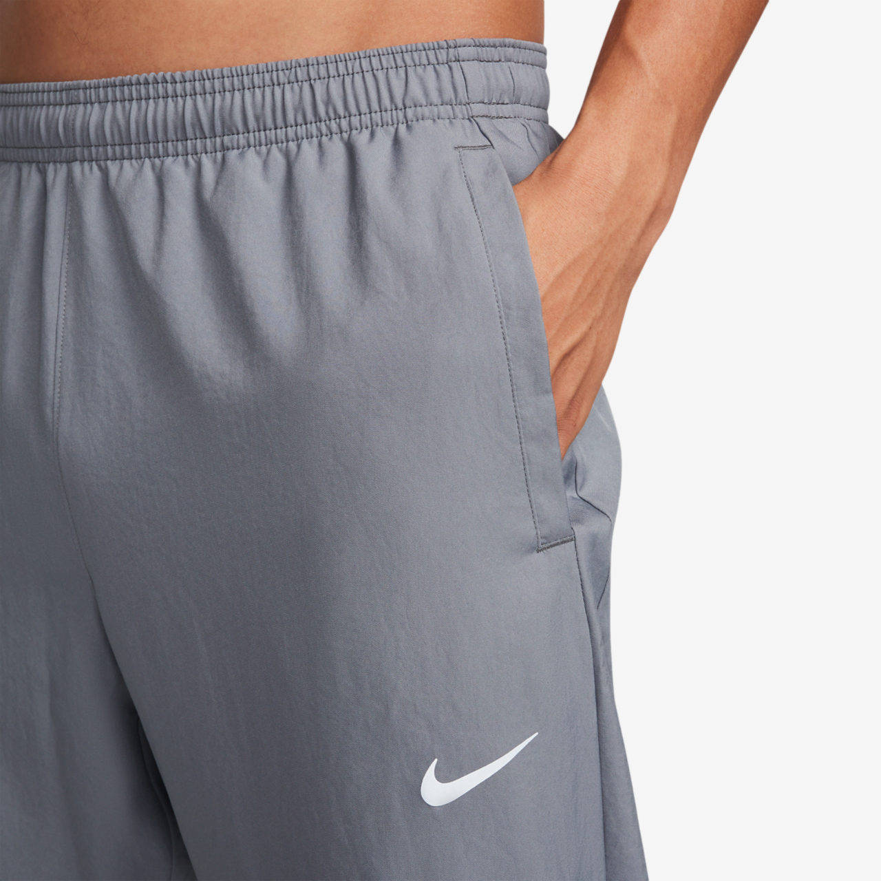 Nike Dri-FIT Challenger Woven Pant Image 3 of 4. Tap to open photo gallery.
