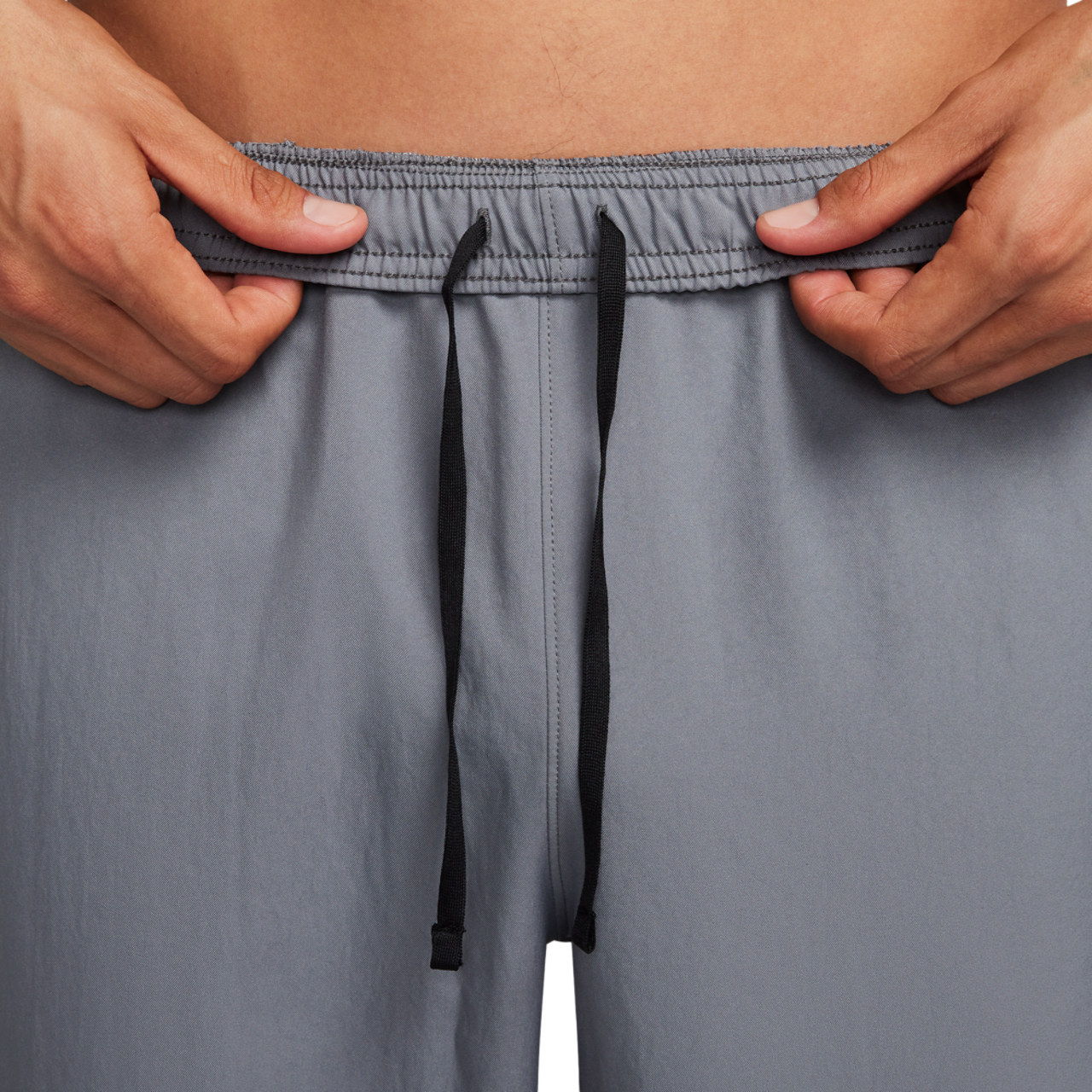 Nike Dri-FIT Challenger Woven Pant Image 4 of 4. Tap to open photo gallery.