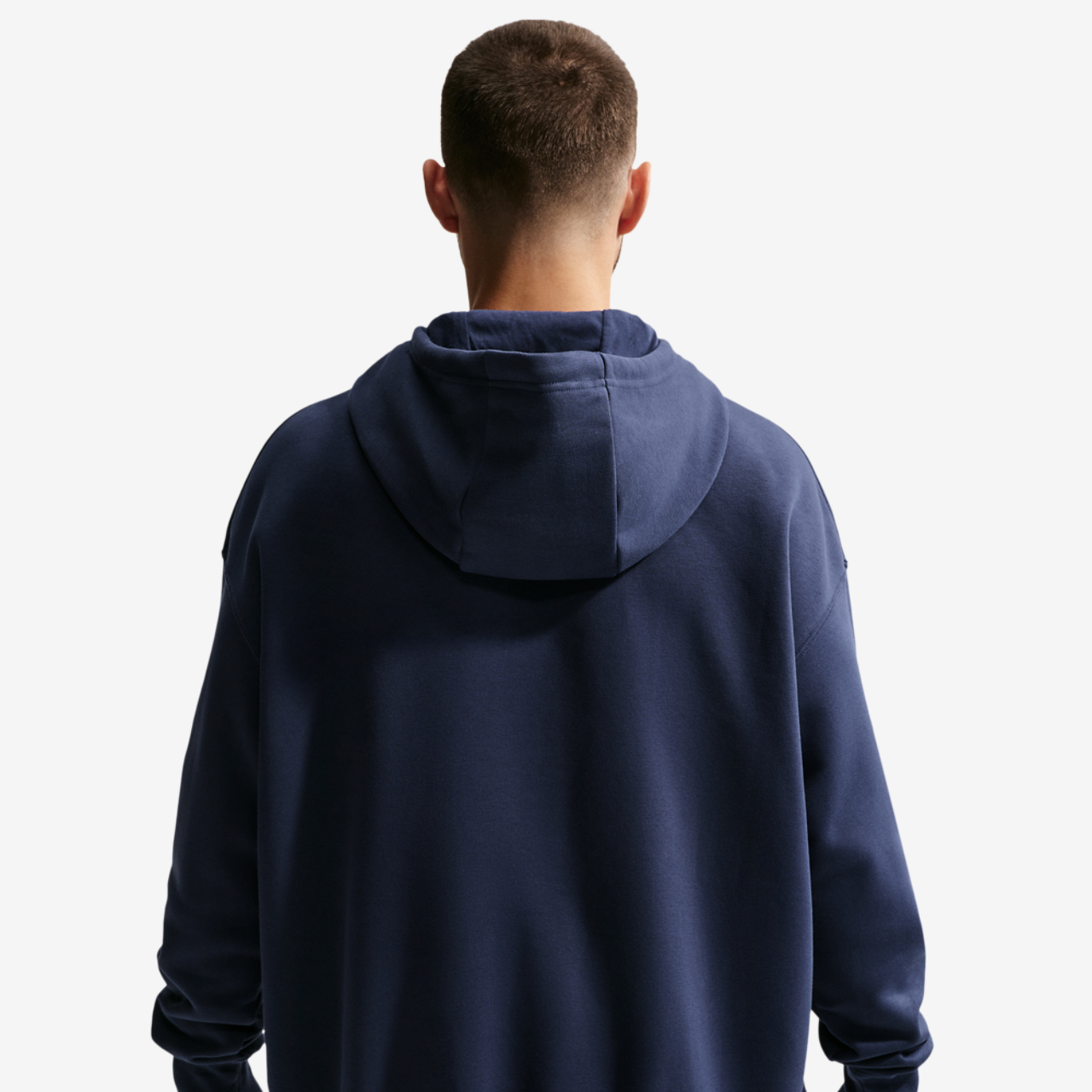 Nike CC Fleece Pullover Essentials Hoodie Image 2 of 6. Tap to open photo gallery.