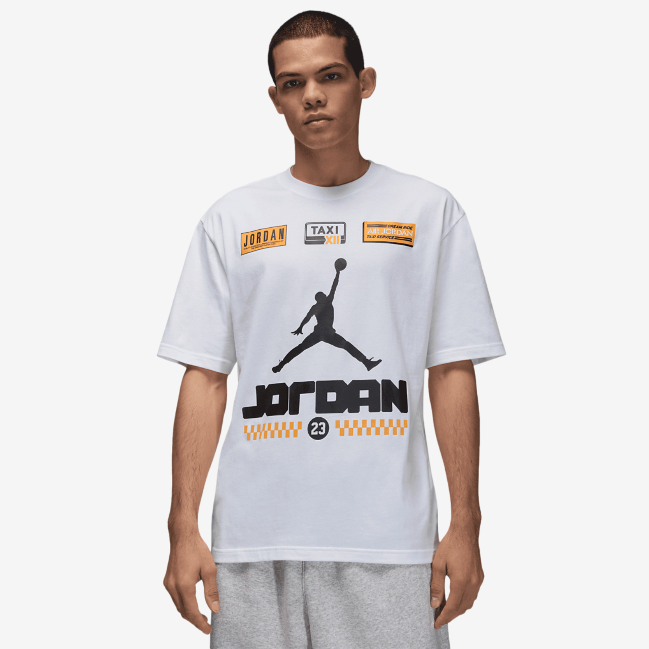 Jordan AJ 12 Taxi '85 Short Sleeve Crew Image 1 of 5. Tap to open photo gallery.