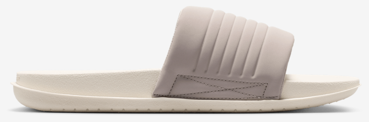 Nike Offcourt Slides Image 1 of 4. Tap to open photo gallery.