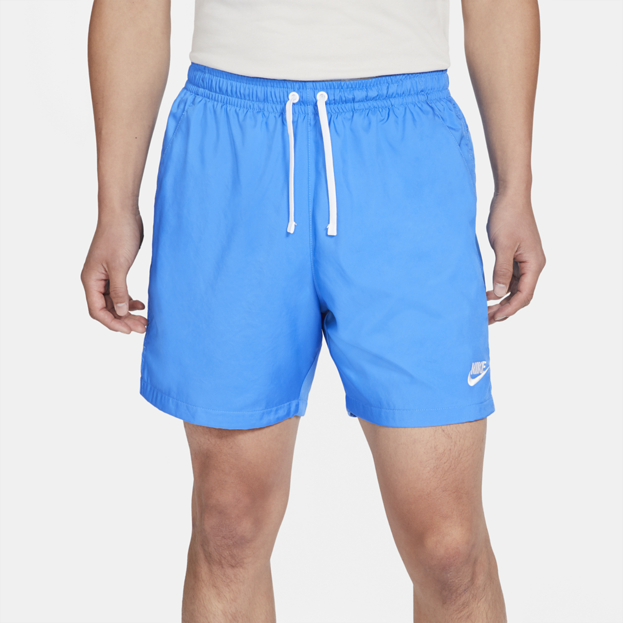 Nike Club Essentials Woven Flow Shorts Image 1 of 2. Tap to open photo gallery.
